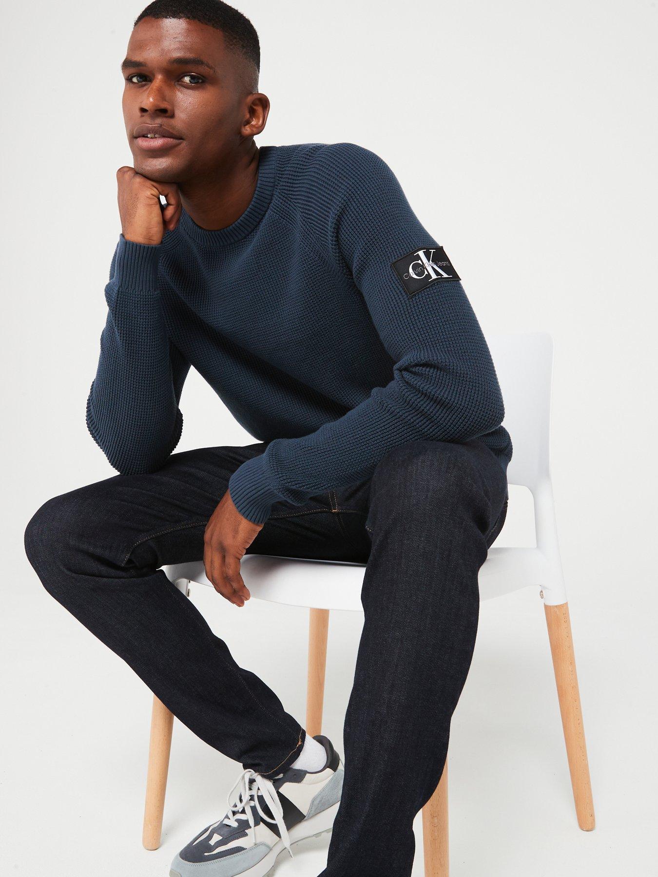 Image 4 of 5 of Calvin Klein Jeans Badge Sleeve Easy Knitted Jumper - Navy