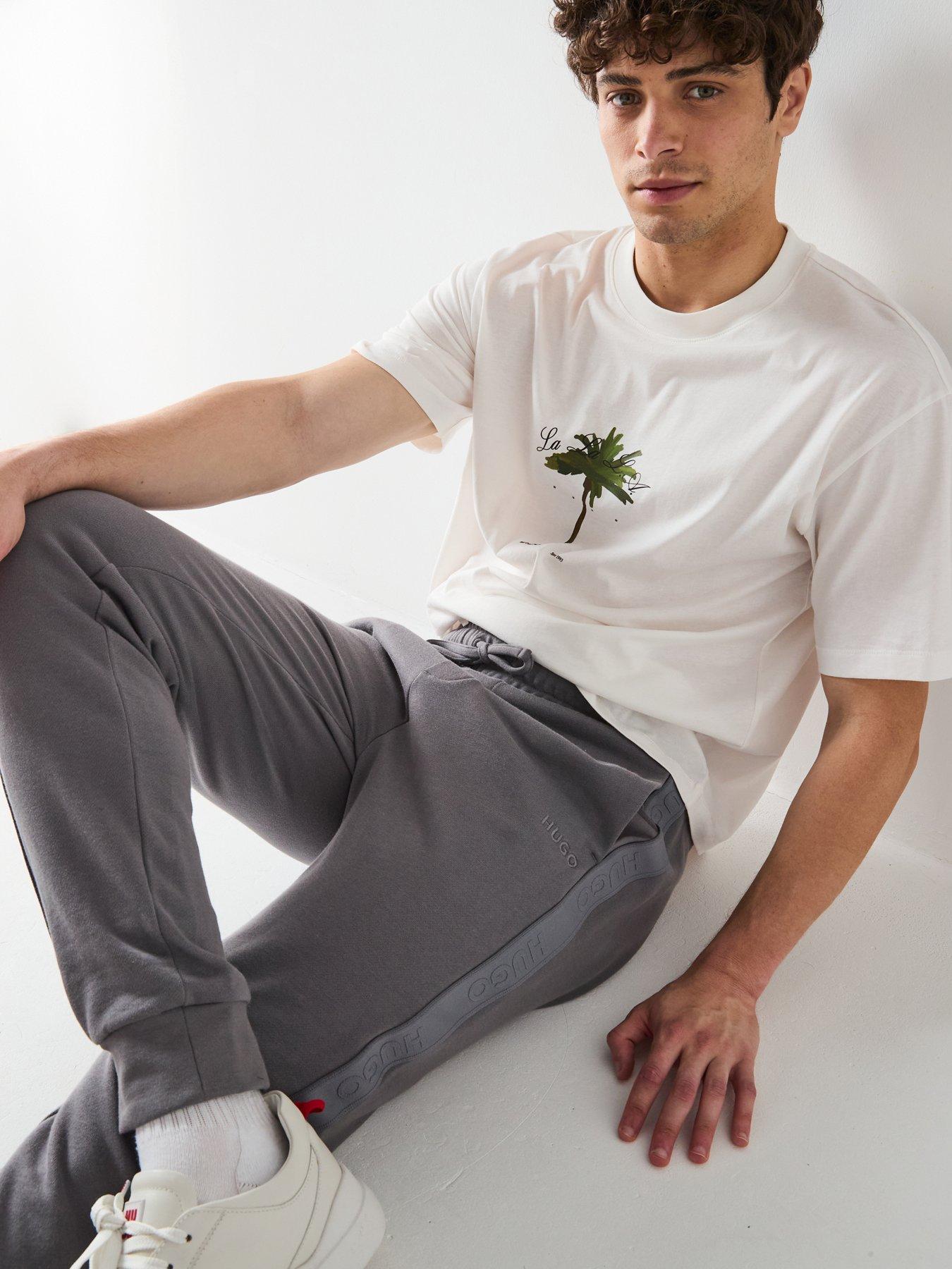 Hugo Pants con logo Niño - El Palacio de Hierro