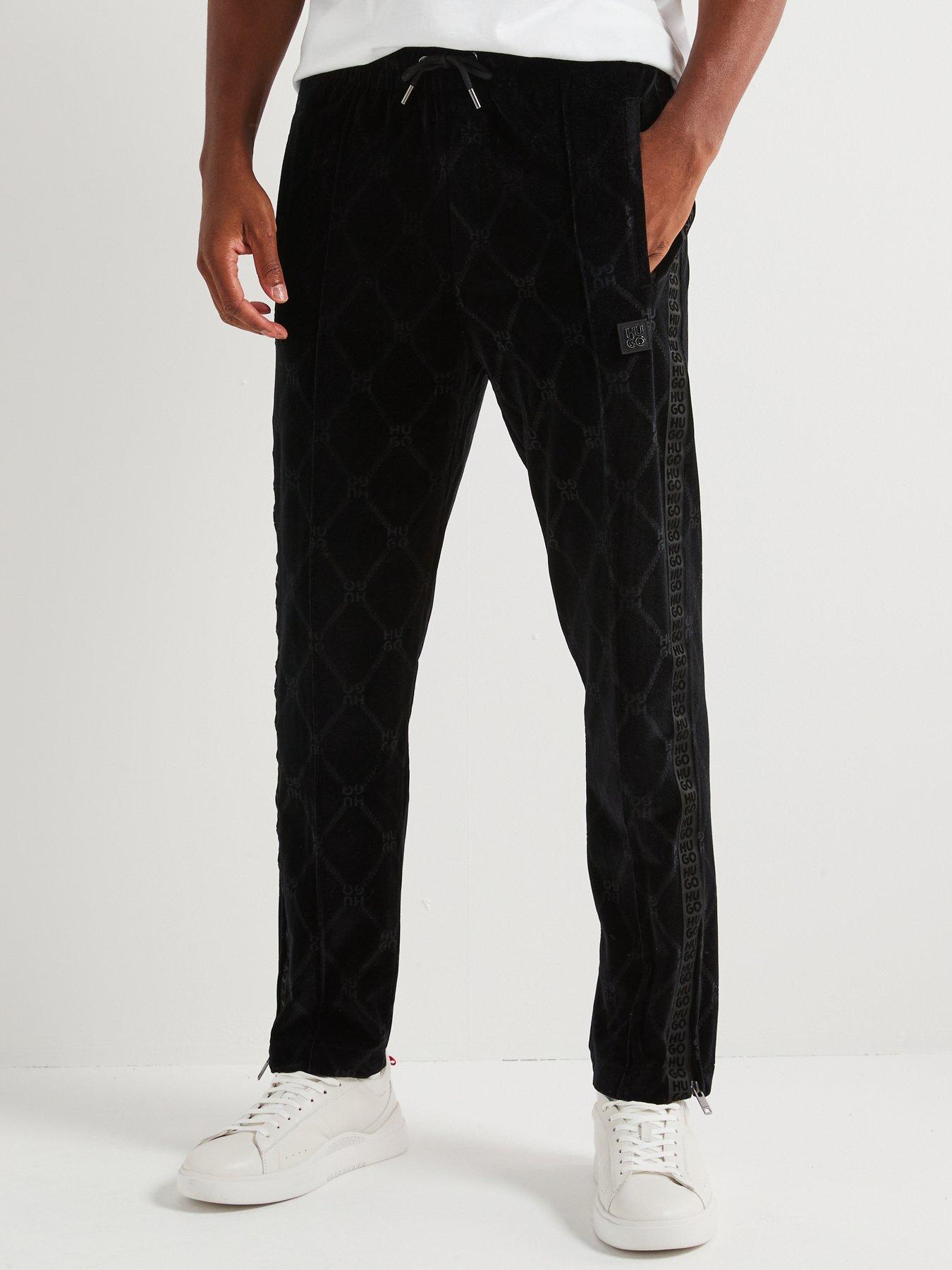 undefined Dislaco Mono Chain Relaxed Fit Velour Trousers - Black