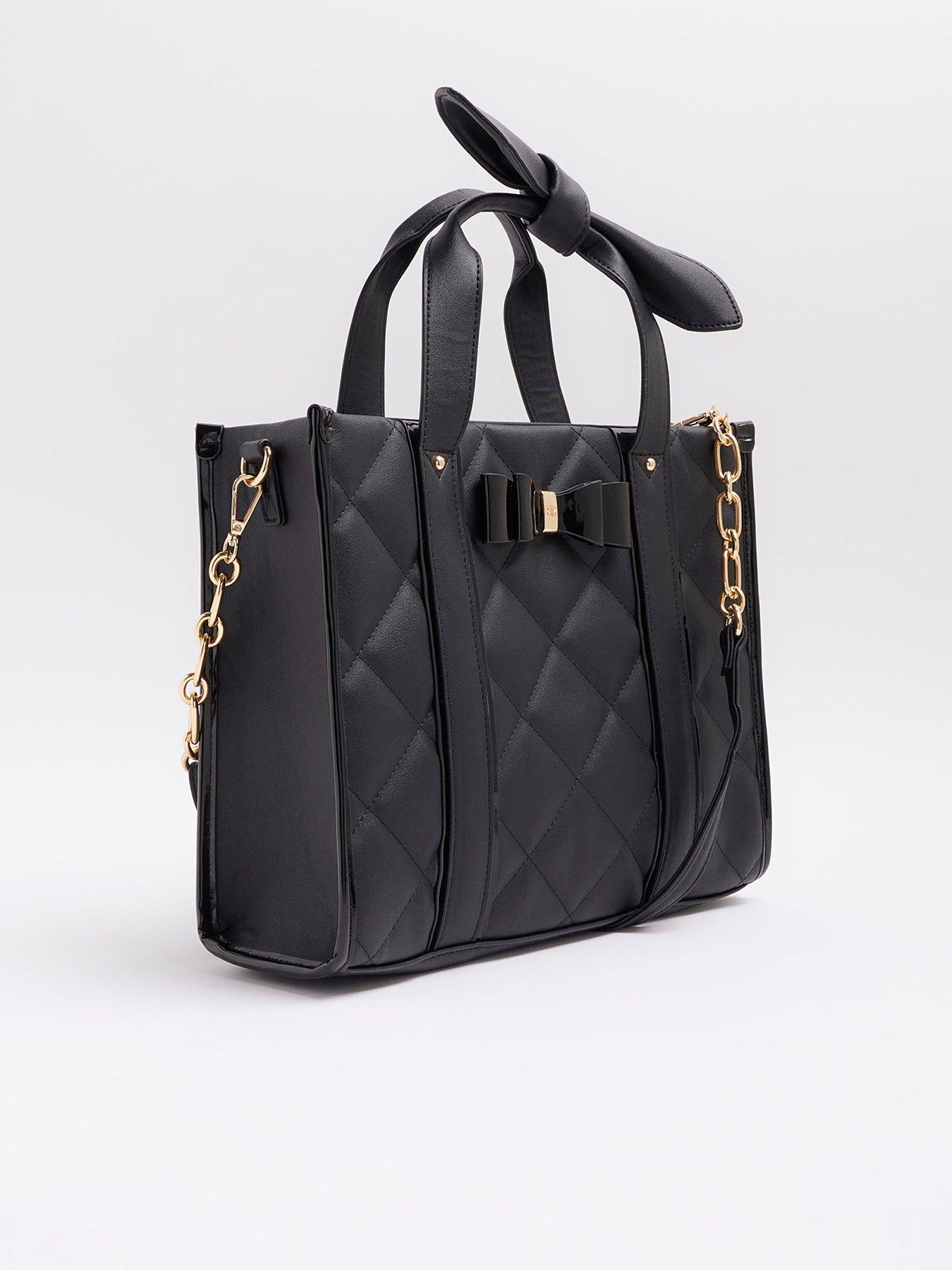 Black boxy quilted tote handbag hotsell