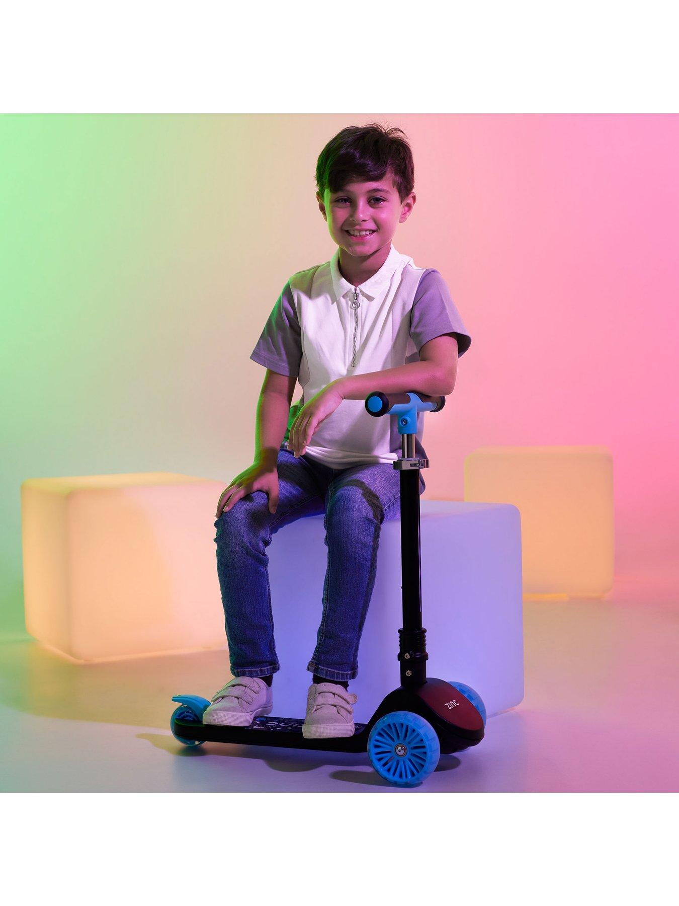 Image 6 of 8 of Zinc Three Wheeled Folding T-Motion Shine Scooter - Blue
