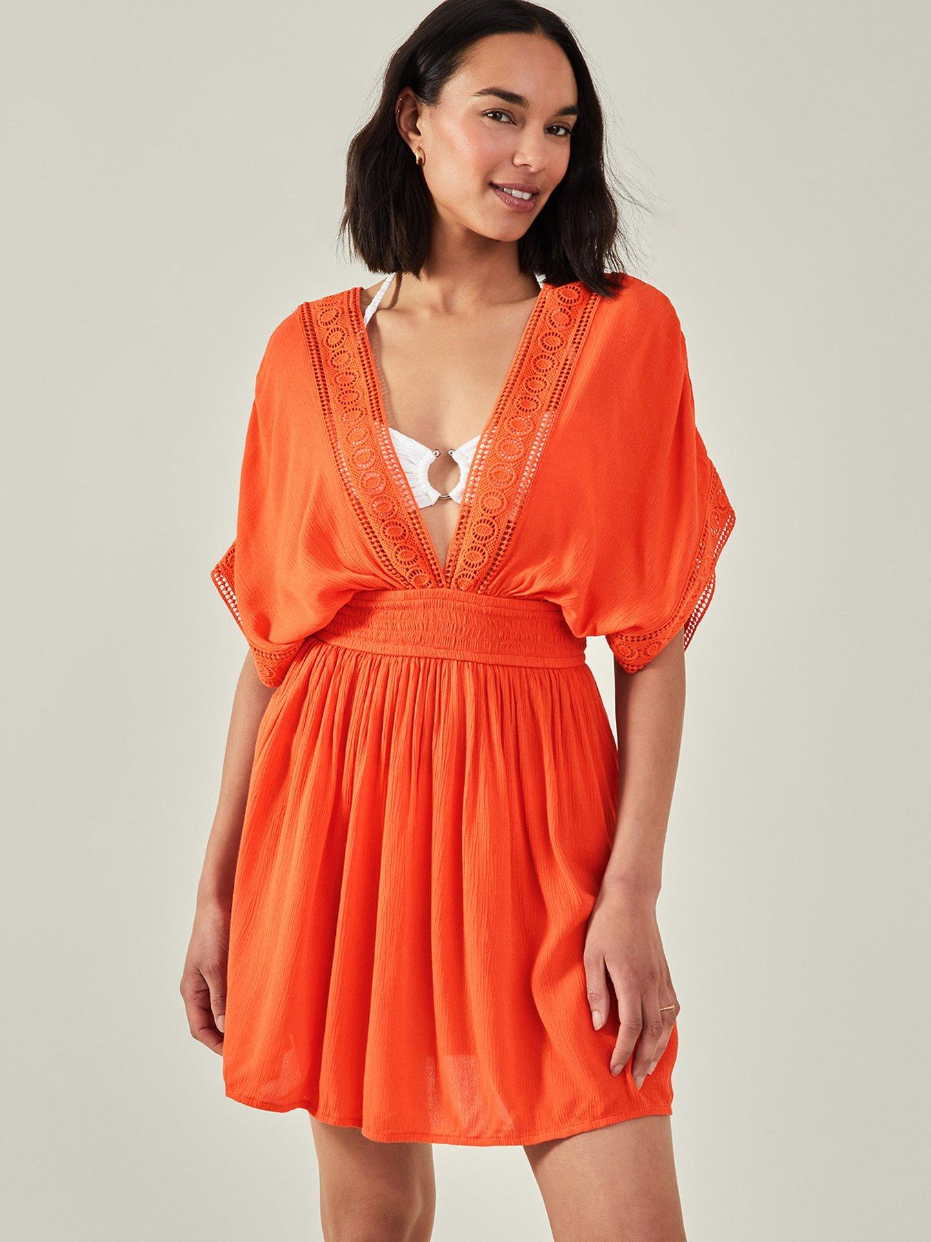 sachin and babi light blue dress How to Accessorize Orange Dresses: A Complete Guide