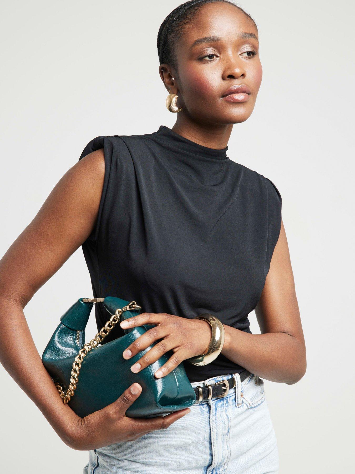Sleeveless shoulder pad top sale