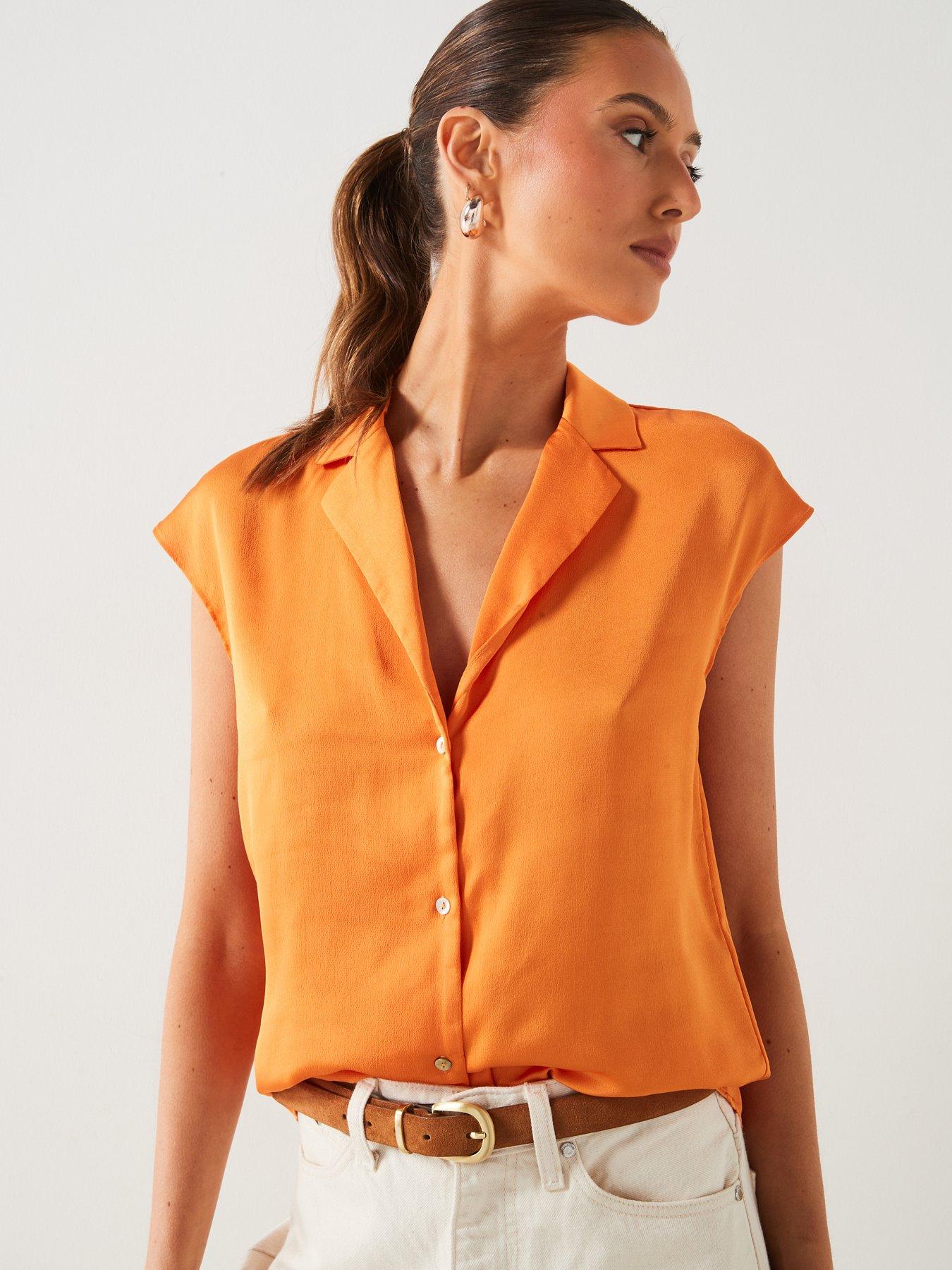 Orange flowy top on sale