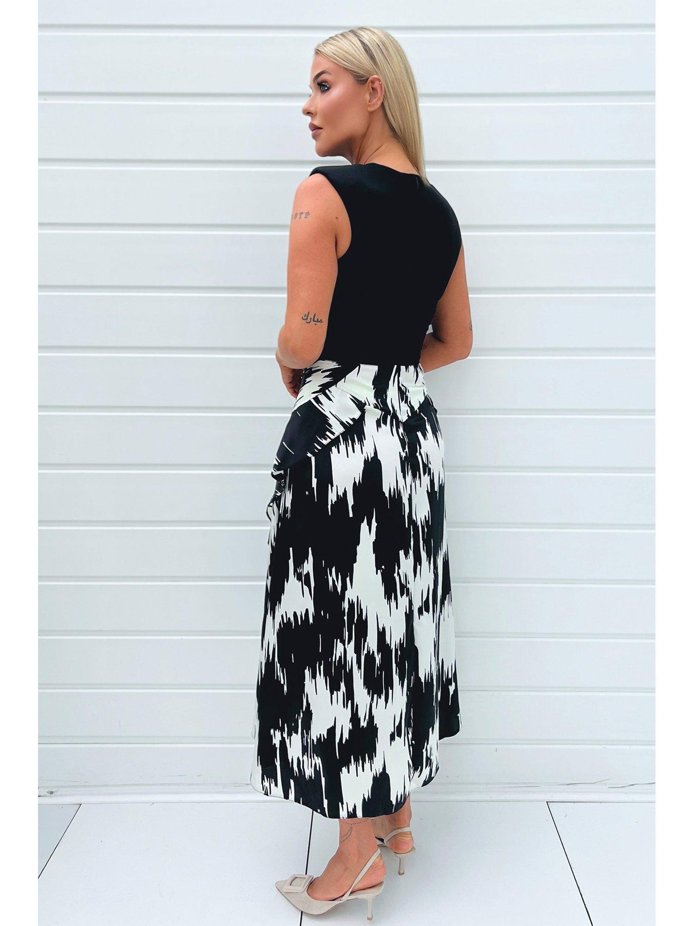 Black and white split dress shop