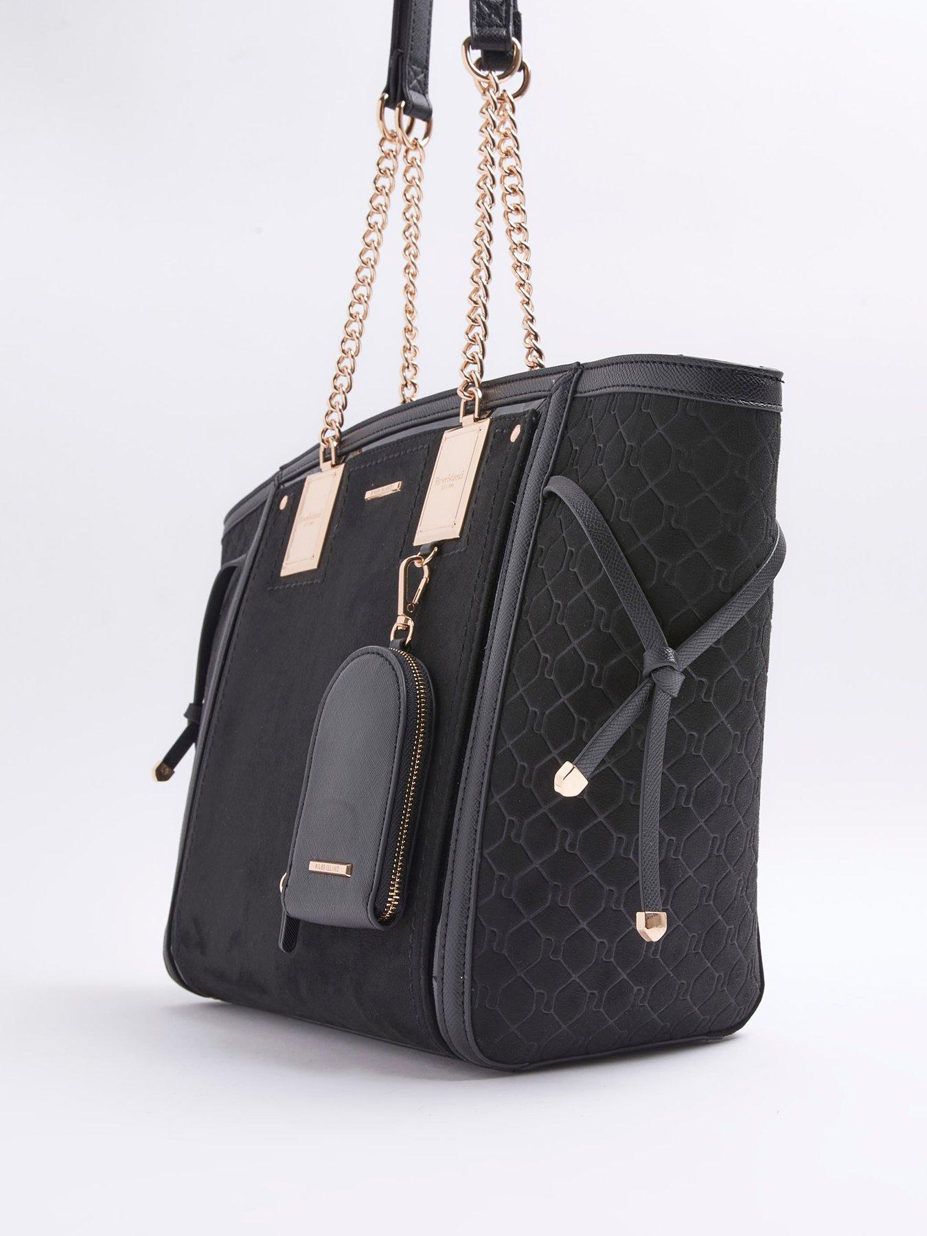 Black winged chain handle tote bag sales