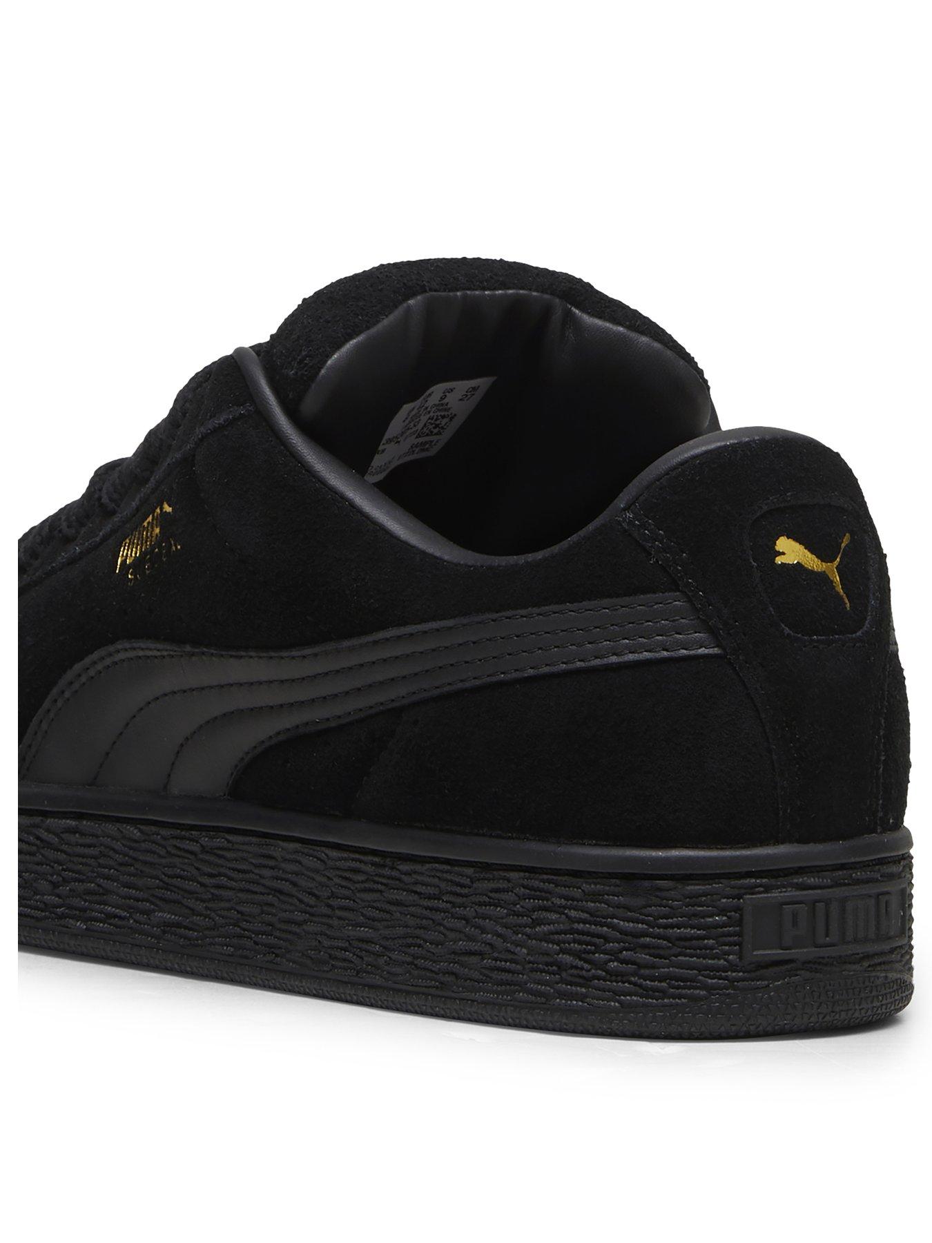 Suede black pumas on sale
