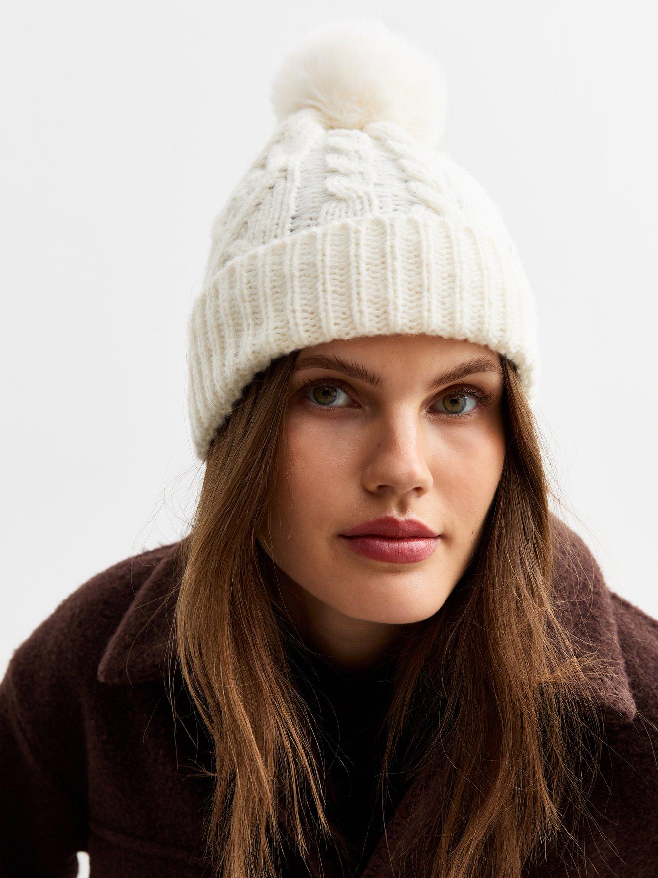 Cream hat with pom pom online