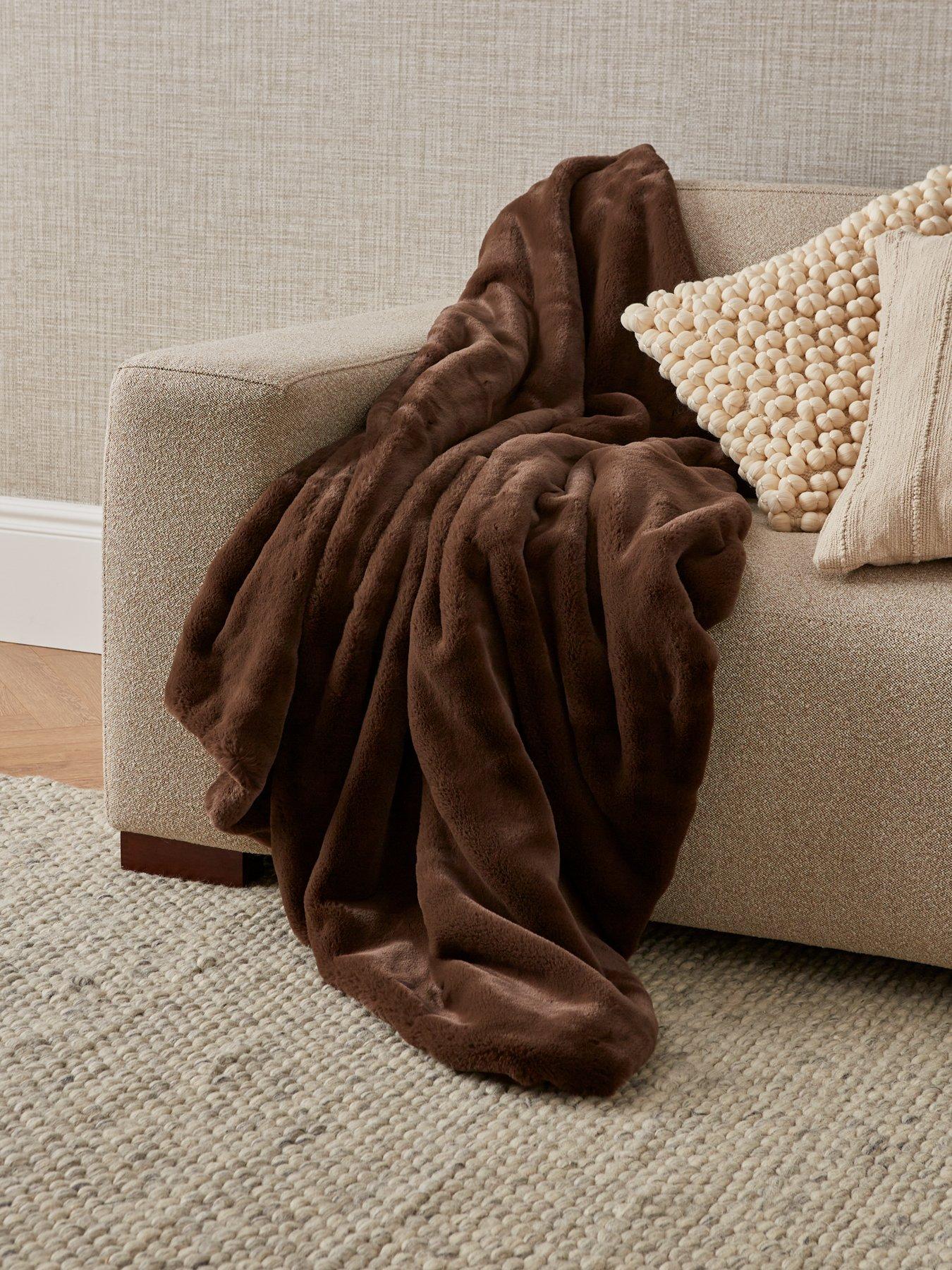 Product photograph of Michelle Keegan Home Faux Sable Throw 127x152 from very.co.uk