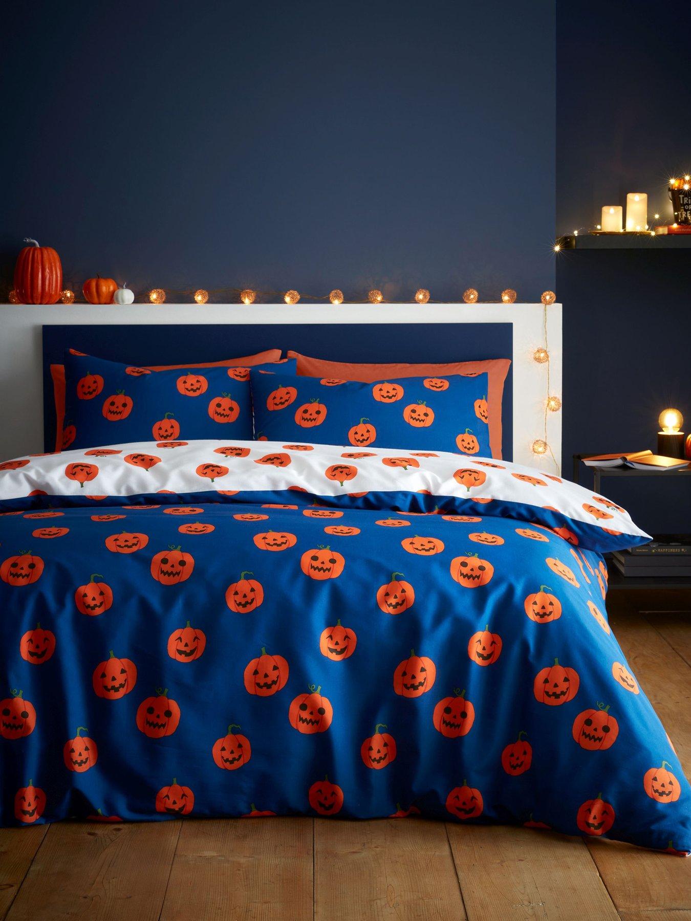 Product photograph of Catherine Lansfield Halloween Pumpkins Reversible Duvet Cover Set from very.co.uk