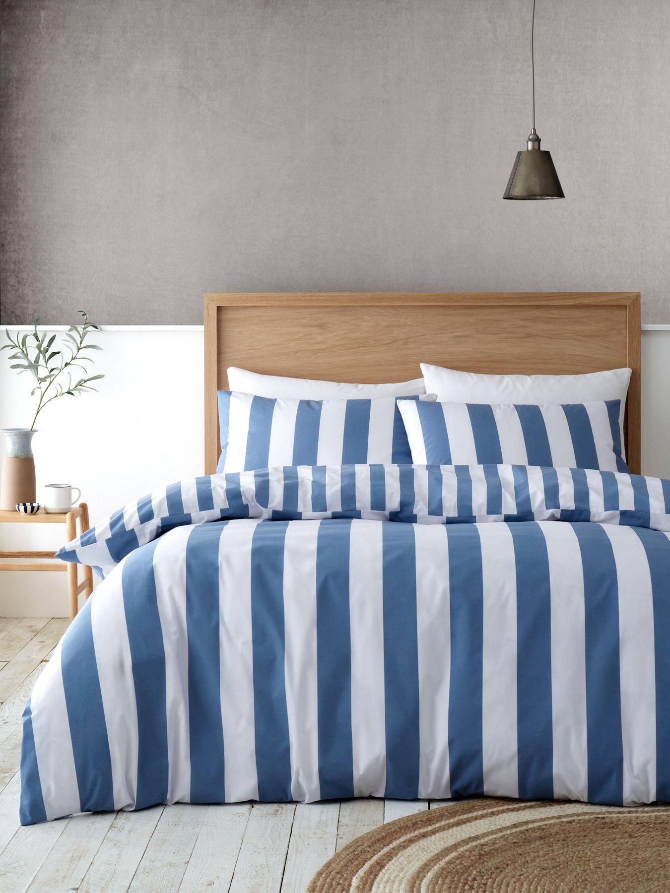 Product photograph of Catherine Lansfield Cove Stripe Blue Reversible Duvet Cover Set from very.co.uk