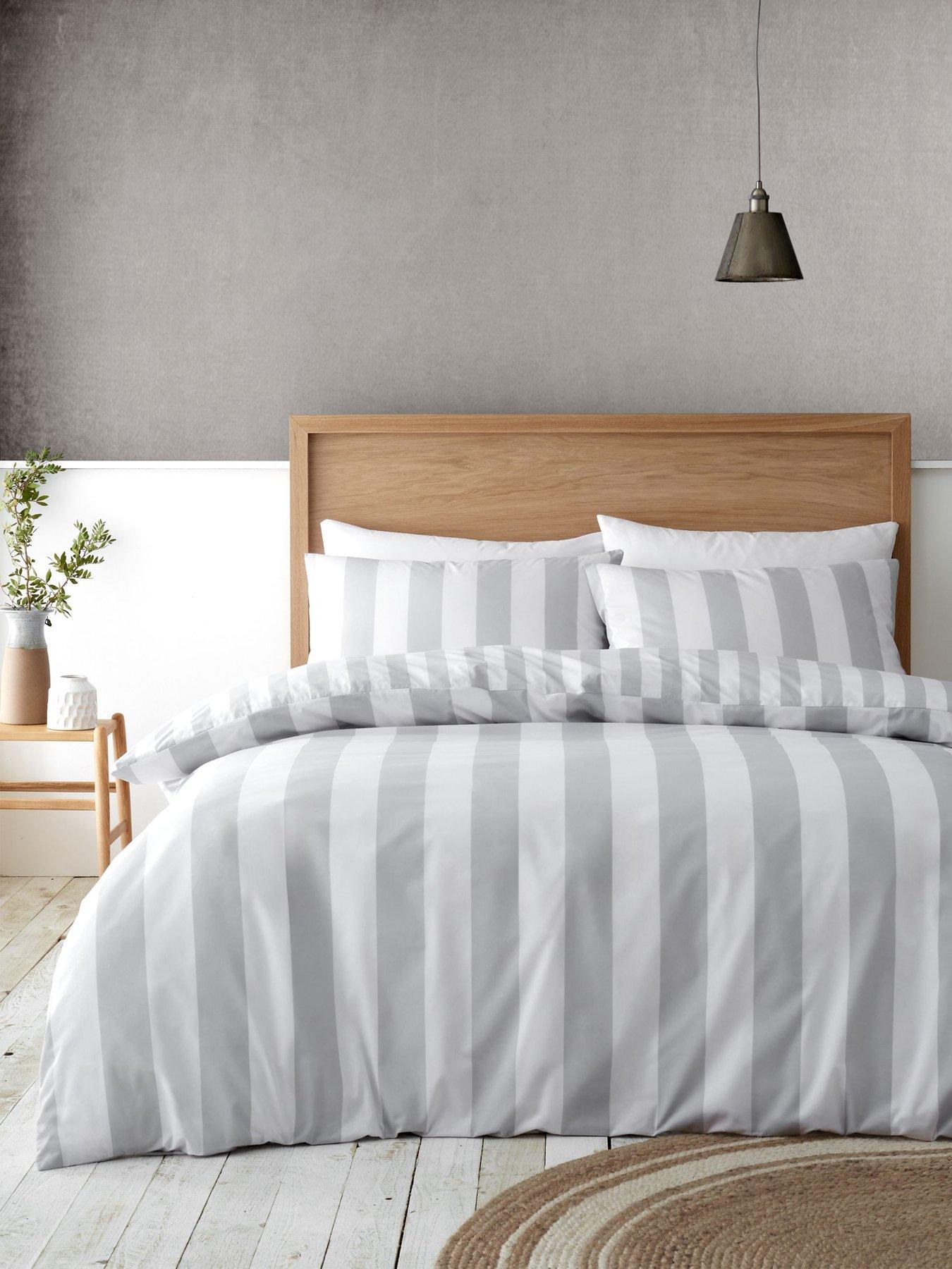 Product photograph of Catherine Lansfield Cove Stripe Silver Reversible Duvet Cover Set from very.co.uk