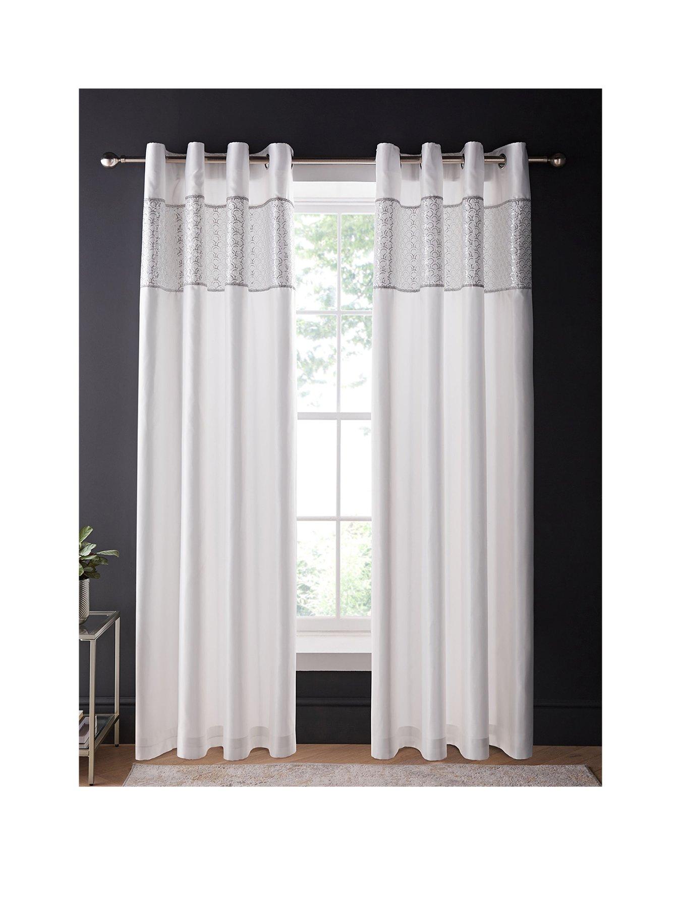 Product photograph of Catherine Lansfield Deco Sequin Lined Eyelet Curtains In White from very.co.uk