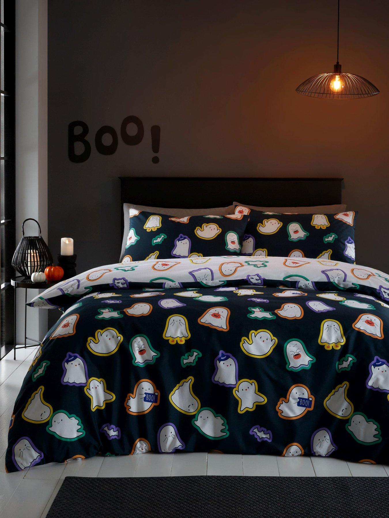 Product photograph of Catherine Lansfield Halloween Ghosts Reversible Duvet Cover Set from very.co.uk