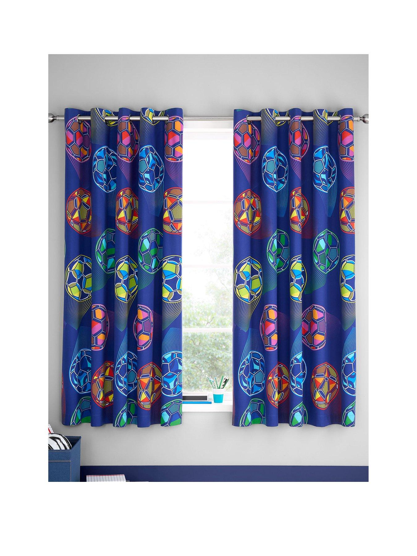 Product photograph of Catherine Lansfield Bright Football Fully Reversible Eyelet Curtains - 66x 72 Inch from very.co.uk