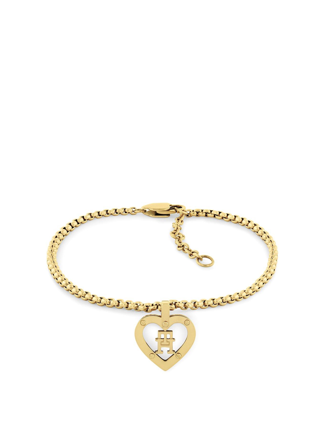 Tommy Hilfiger womens gold plated bracelet with TH monogram heart pendant