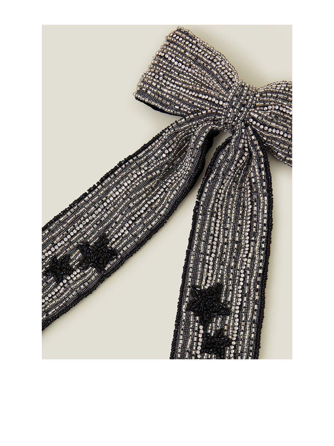 Image 1 of 3 of Accessorize Diamante Star Bow
