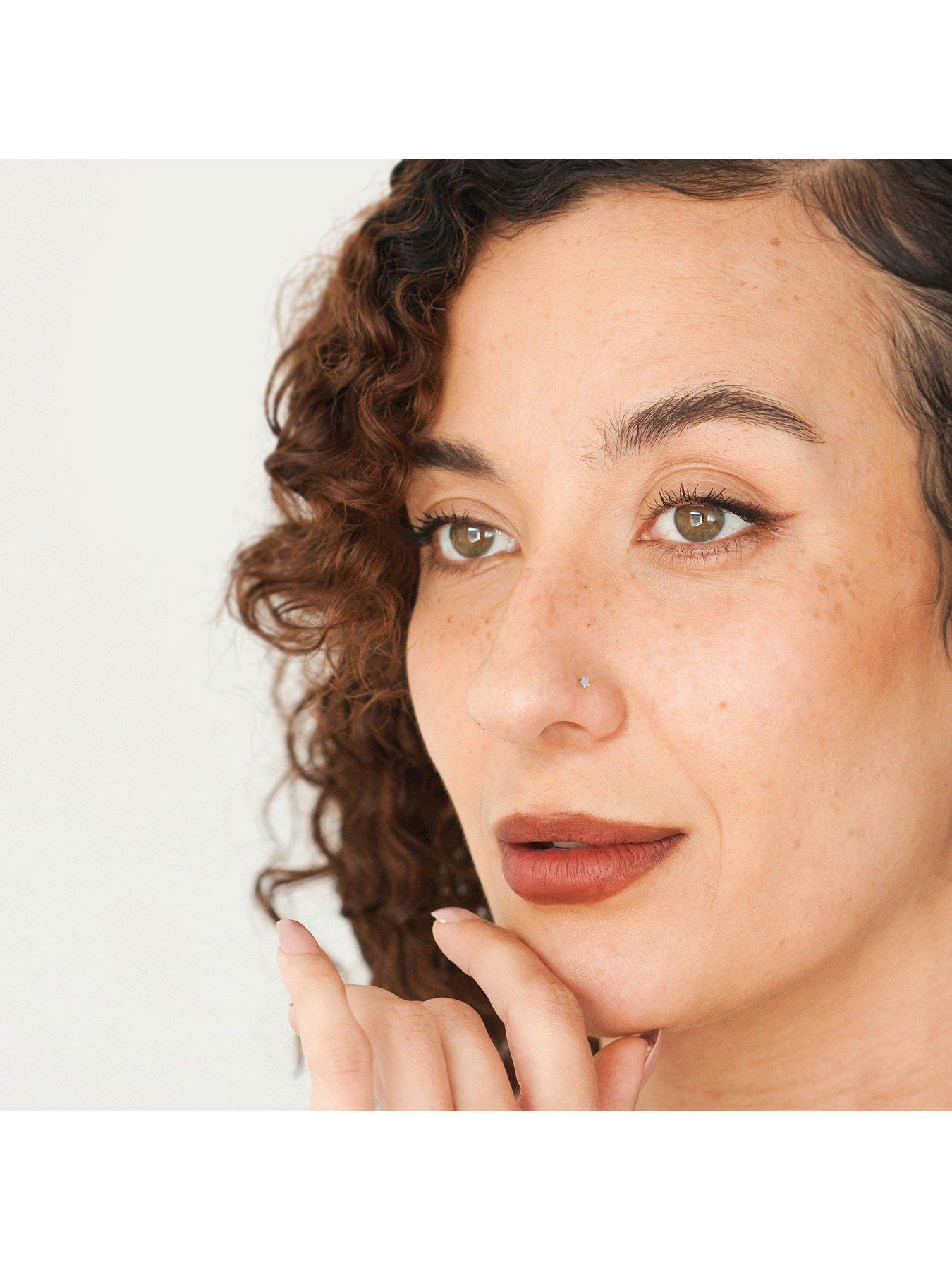 Image 2 of 3 of The Love Collection Sterling Silver Tiny Star Shape Nose Stud