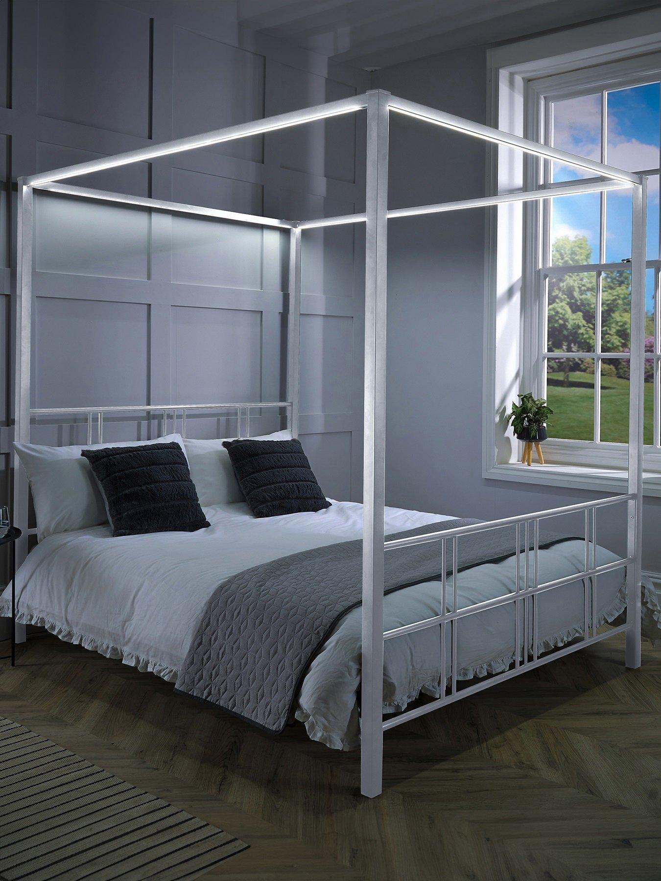 Product photograph of Fern Four Poster Canopy Bed Frame With Led Lighting - White from very.co.uk