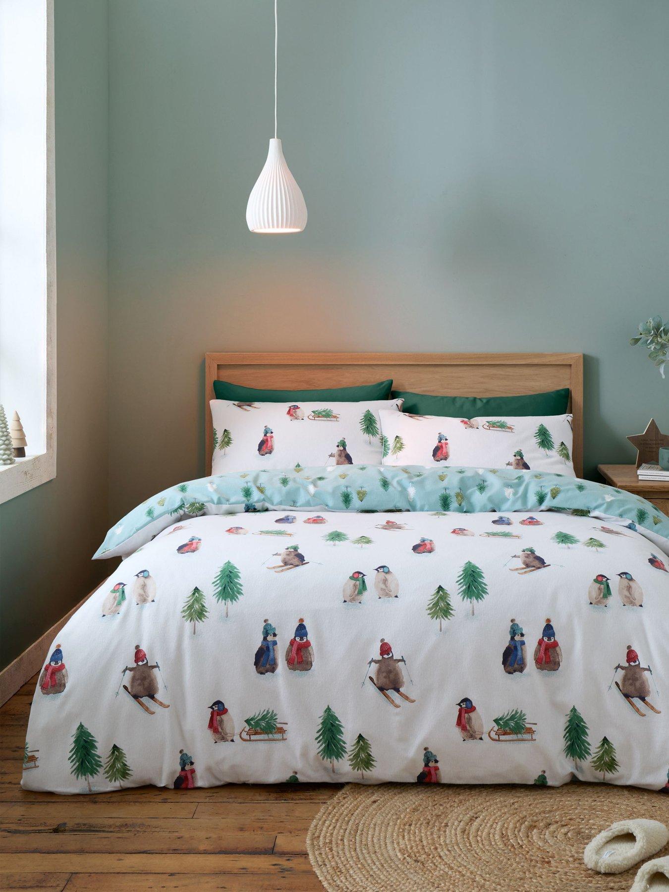 Product photograph of Catherine Lansfield Snowy Penguin Brushed Cotton Christmas Duvet Cover Set from very.co.uk