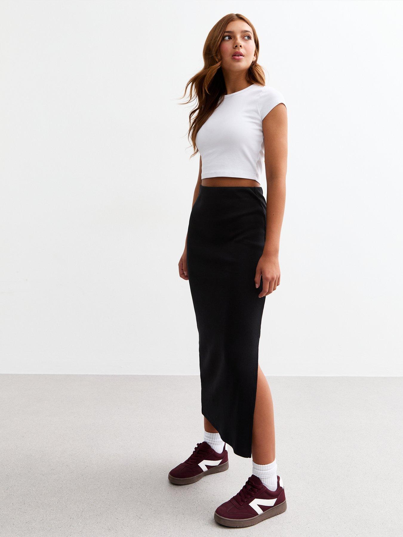Image 1 of 4 of New Look 915 Girls Black Ribbed Split Hem Maxi Skirt