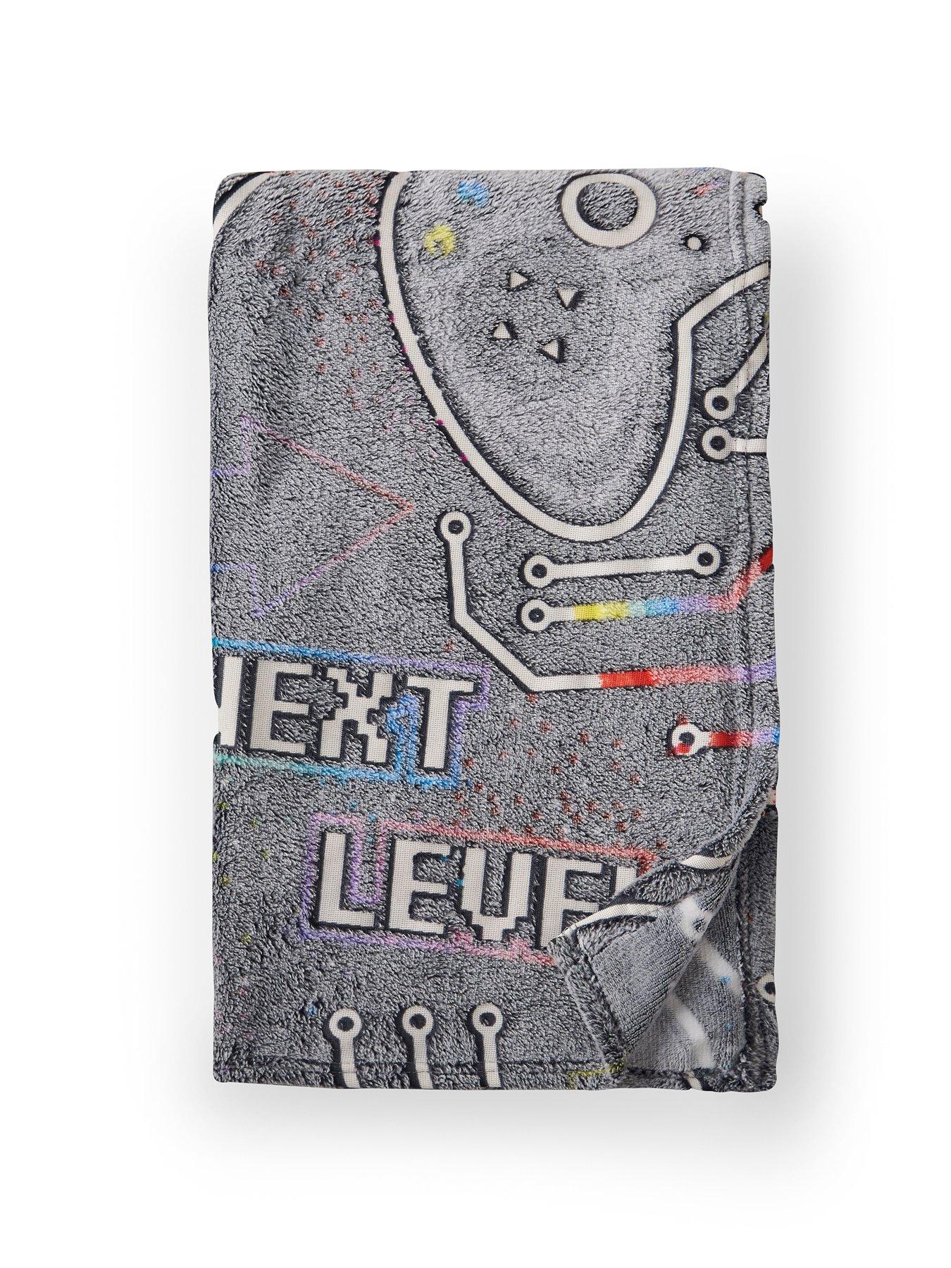 Image 5 of 5 of Catherine Lansfield Game Over Fleece Throw - Black