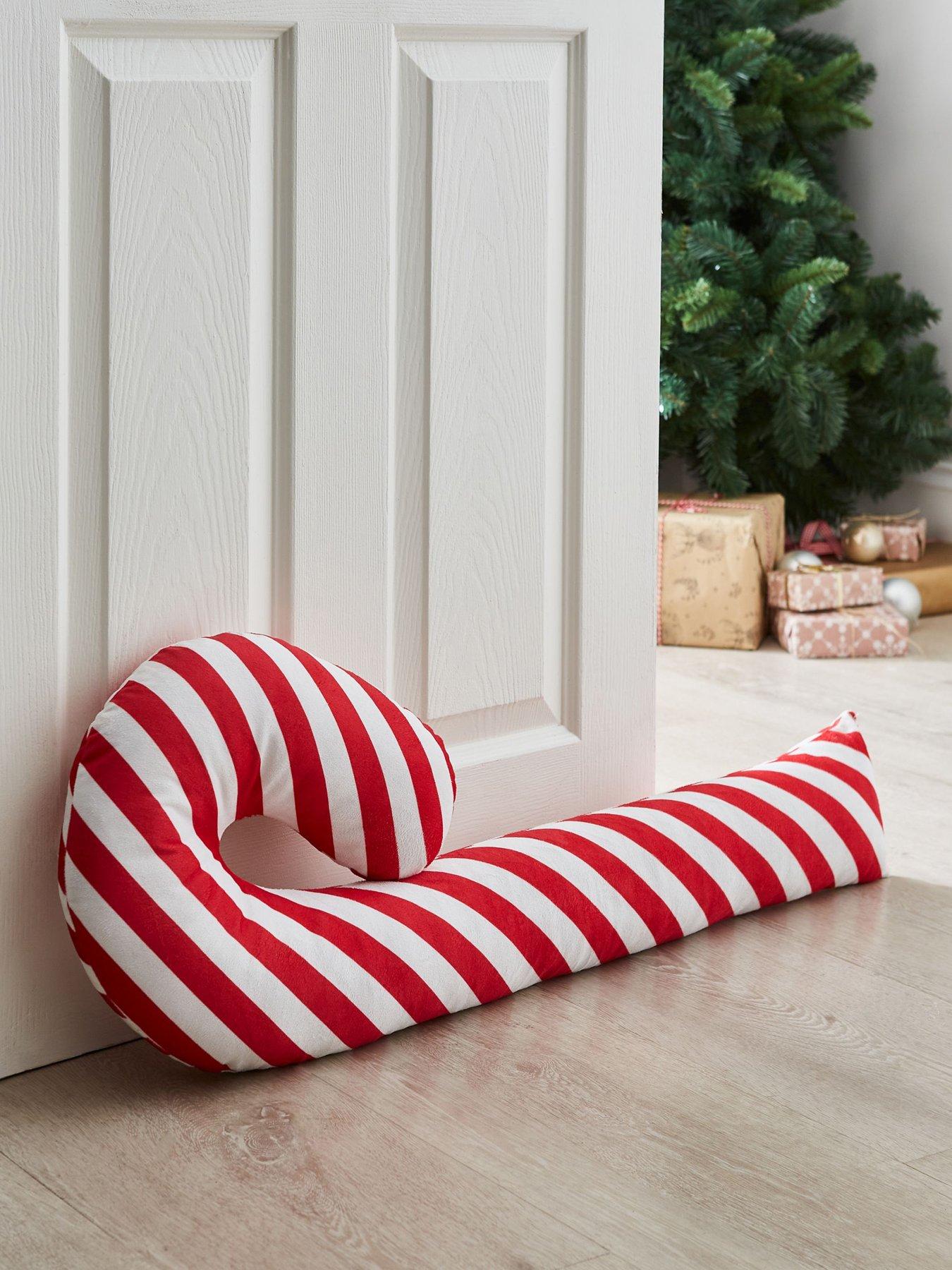 Product photograph of Catherine Lansfield Christmas Candy Cane Draught Excluder from very.co.uk