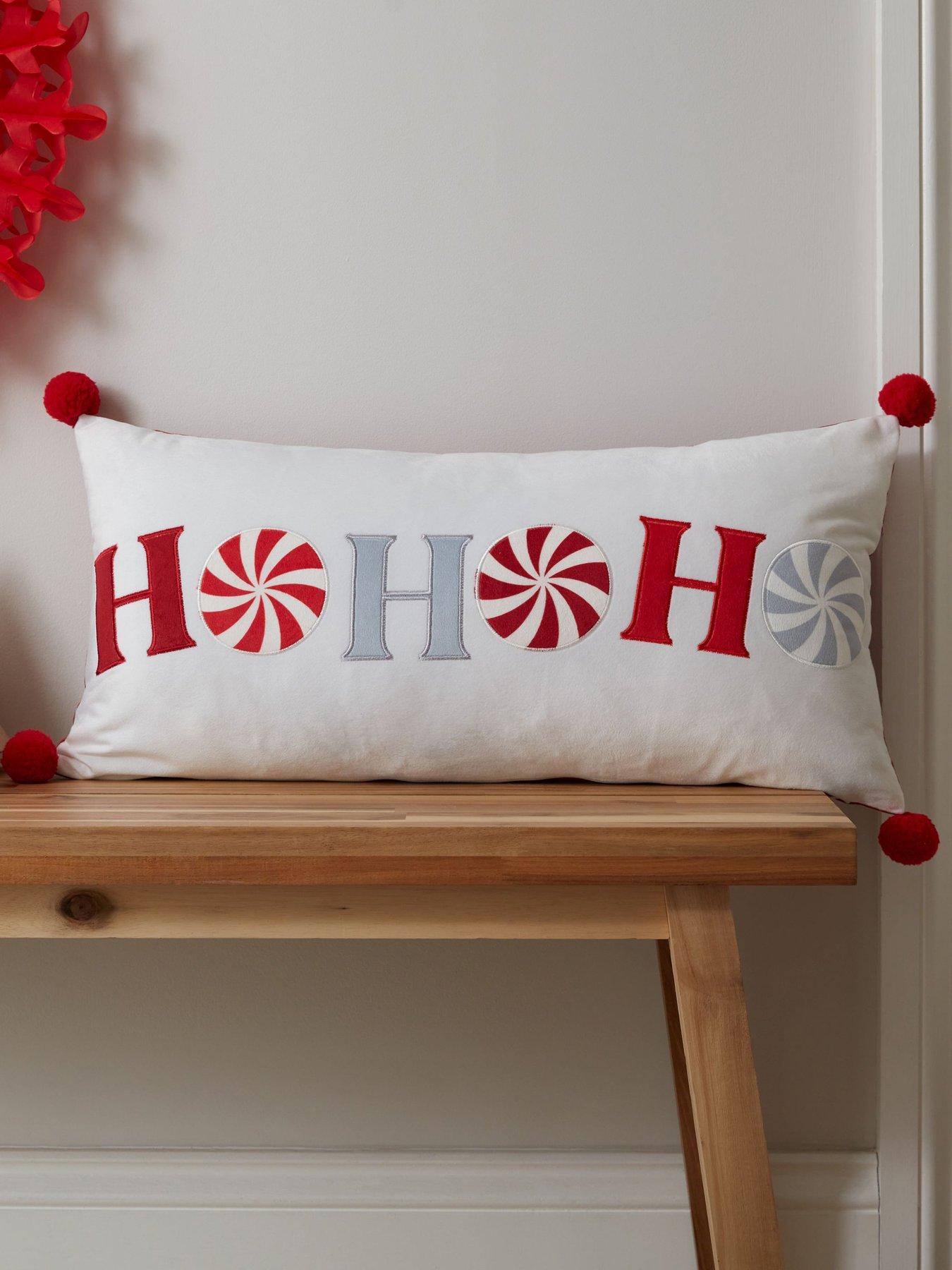 Product photograph of Catherine Lansfield Ho Ho Ho Filled Cushion- 30 X 60cm - White Red from very.co.uk