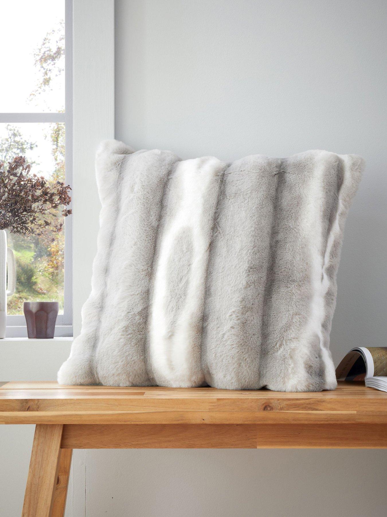 Product photograph of Catherine Lansfield Flint Faux Fur Cushion from very.co.uk