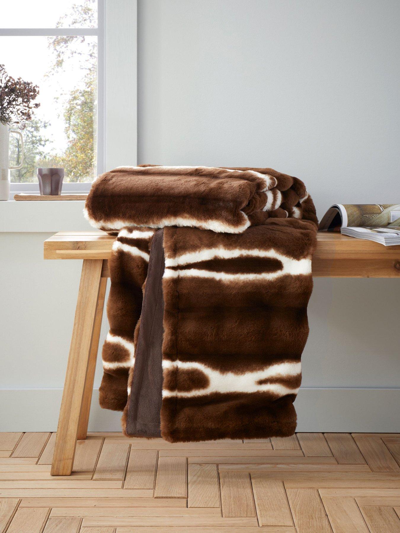 Product photograph of Catherine Lansfield Flint Faux Fur Throw from very.co.uk