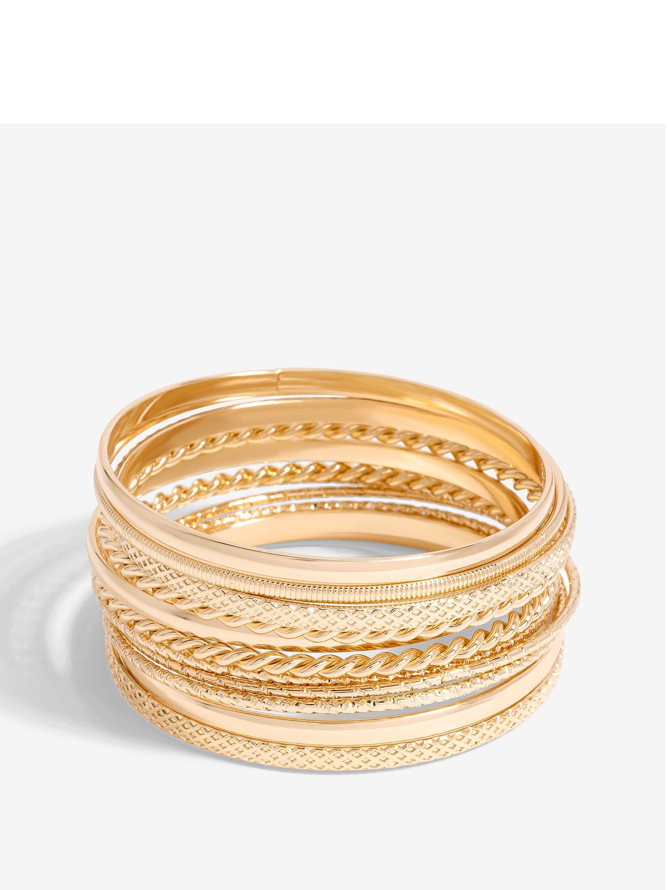 Product photograph of Mood Gold Textured Stacker Bangles from very.co.uk