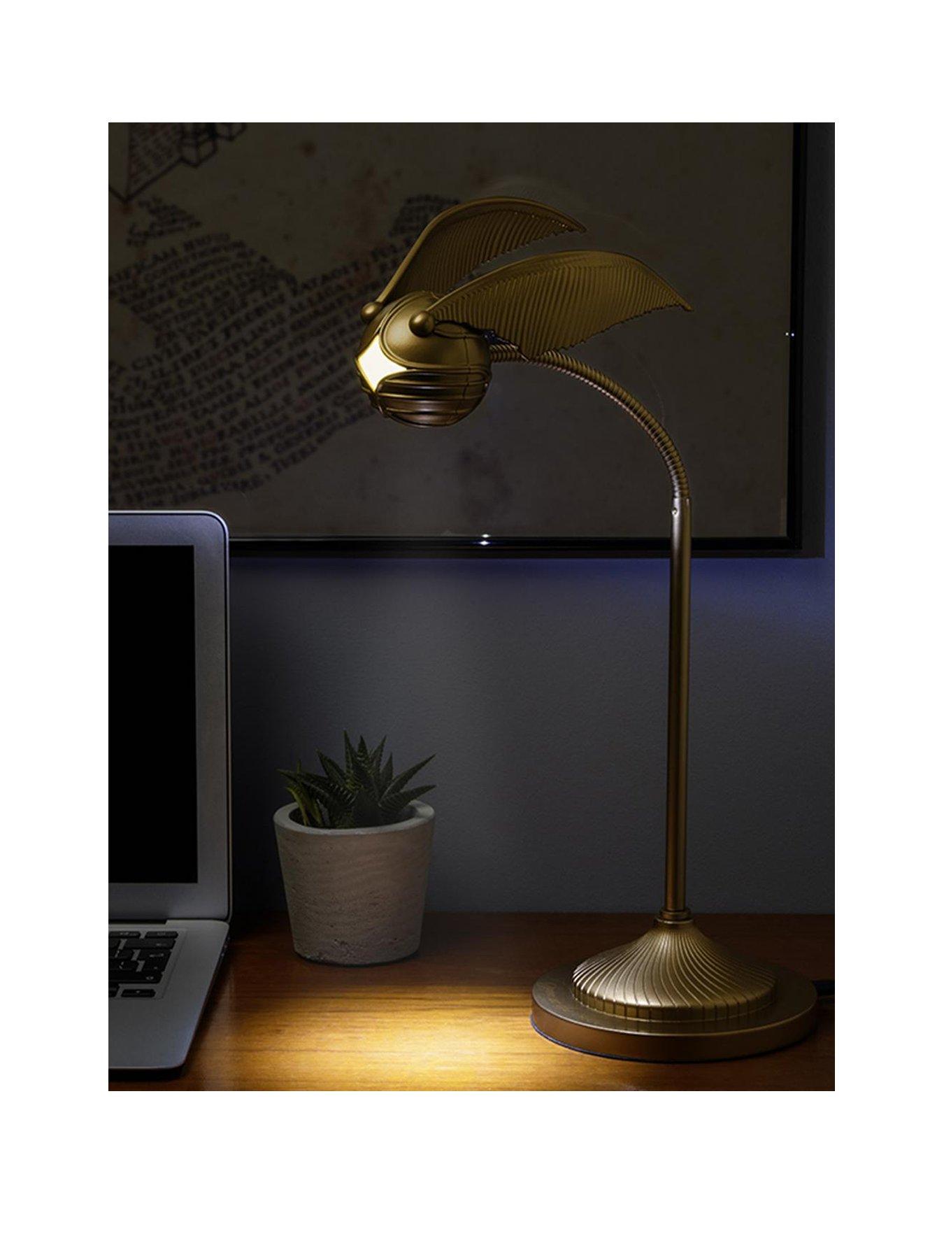 Product photograph of Harry Potter Golden Snitch Posable Desk Lamp from very.co.uk