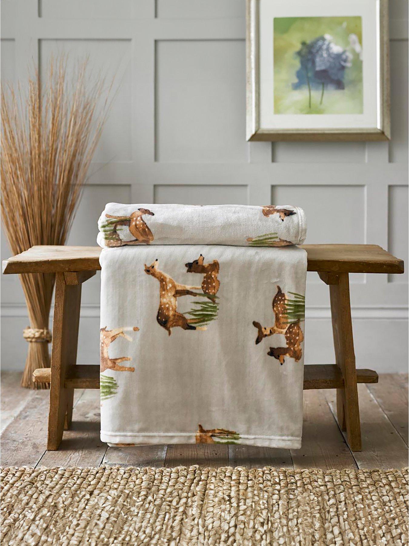 Product photograph of Deyongs Deer Throw Flannel Printed Throw 140x180cm - Natural from very.co.uk