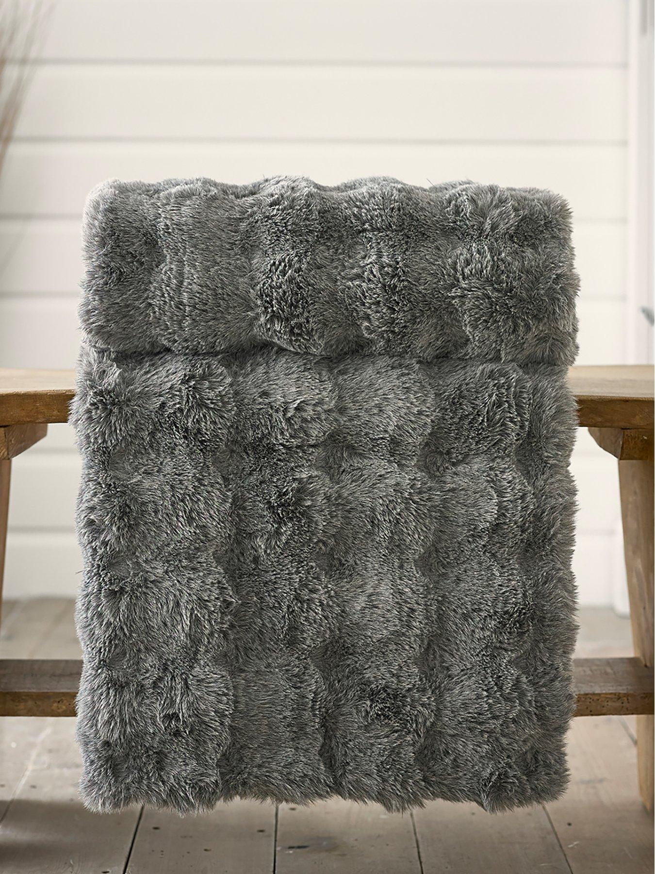 Product photograph of Deyongs Vancouver Faux Fur Throw from very.co.uk