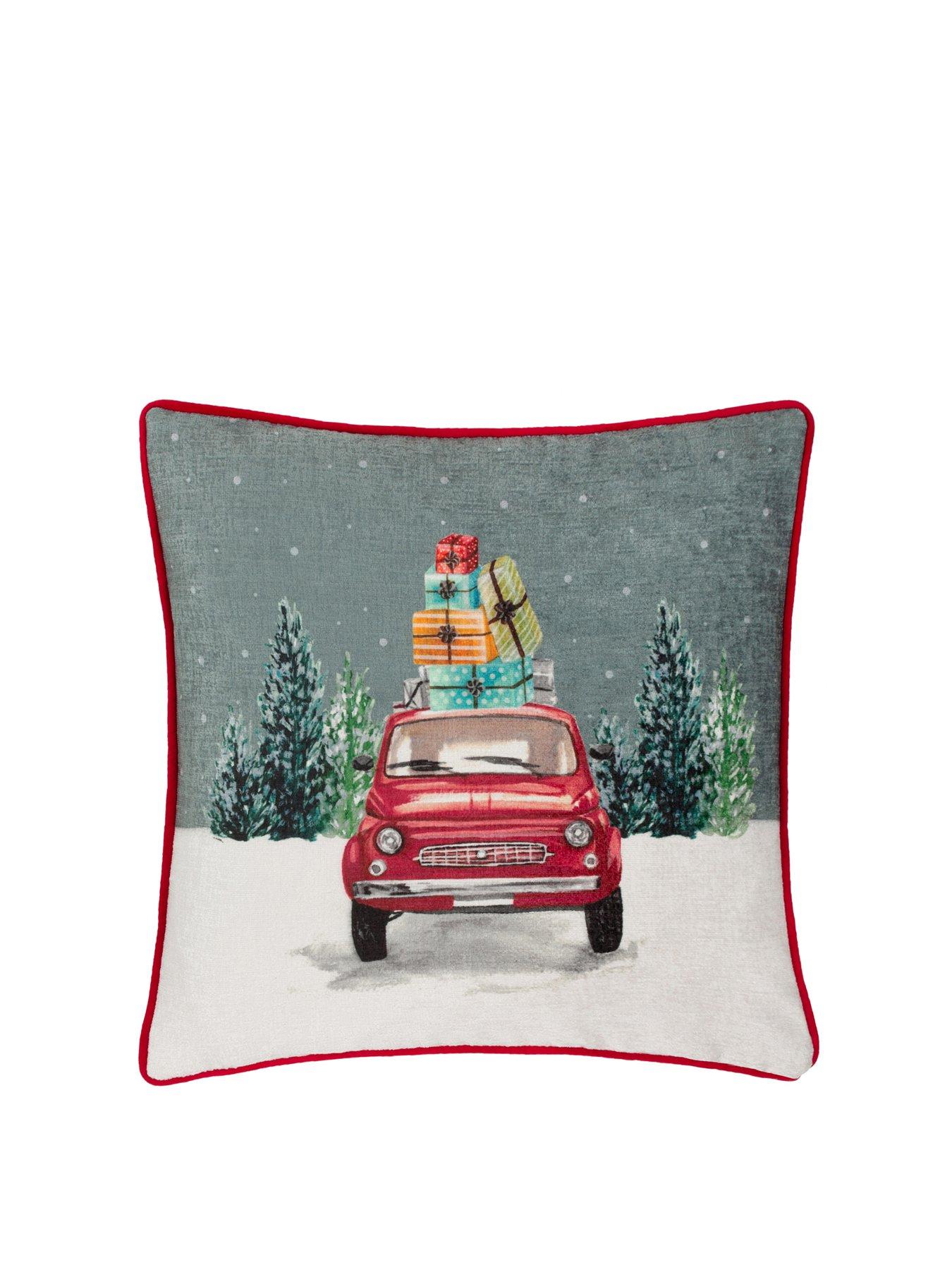 Product photograph of Evans Lichfield Christmas Car Scene Cushion from very.co.uk