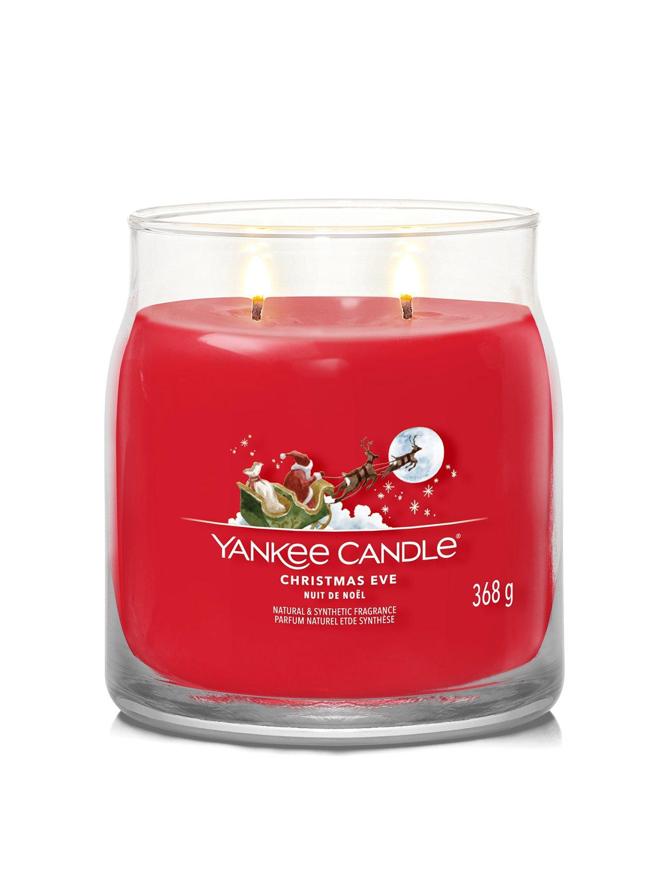 Product photograph of Yankee Candle Christmas Eve Signature Medium Jar Candle from very.co.uk