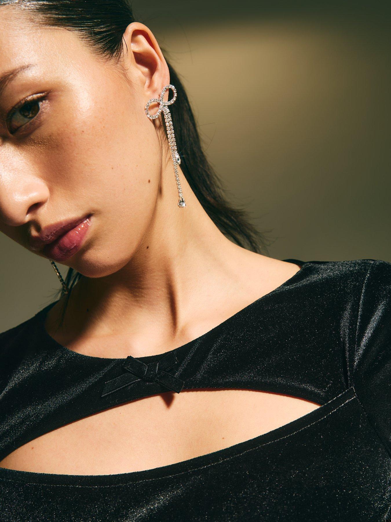 Image 4 of 4 of New Look Bow Cutout Stretch Velvet Long Sleeve Top - Black