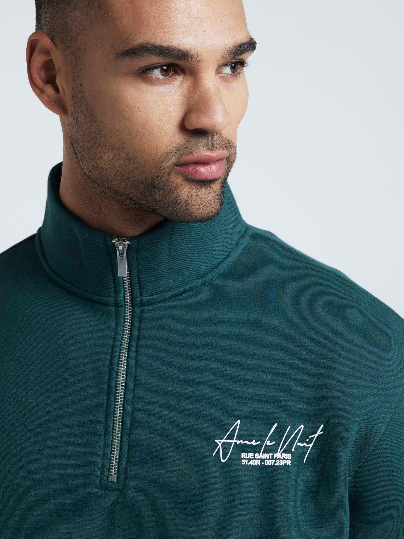 Image 5 of 6 of River Island Regular Fit Ame Le Nuit Text Funnel 1/4 Zip Sweat - Green