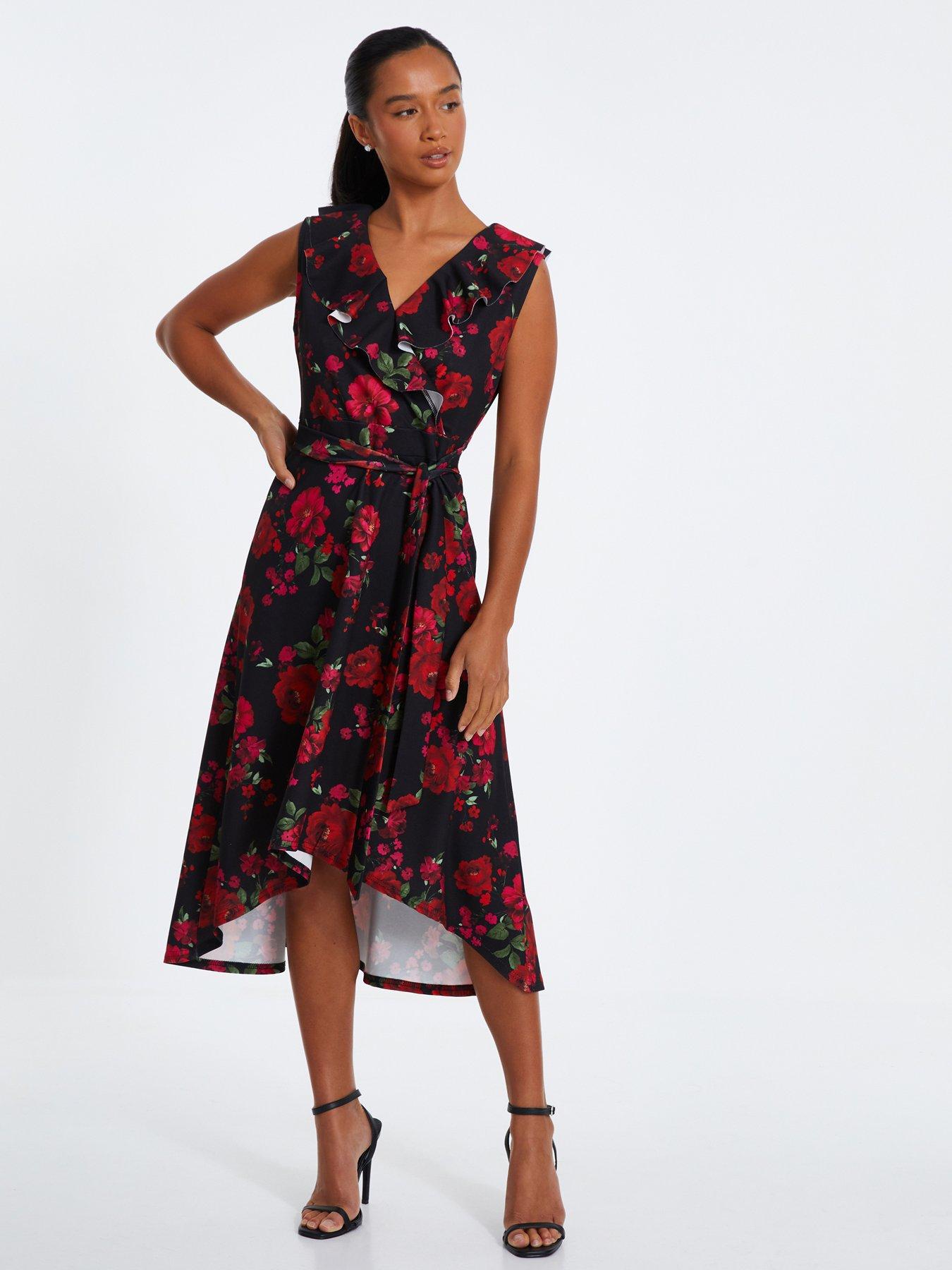 Image 1 of 6 of Quiz Petite Black Floral Dip Hem Midi Dress