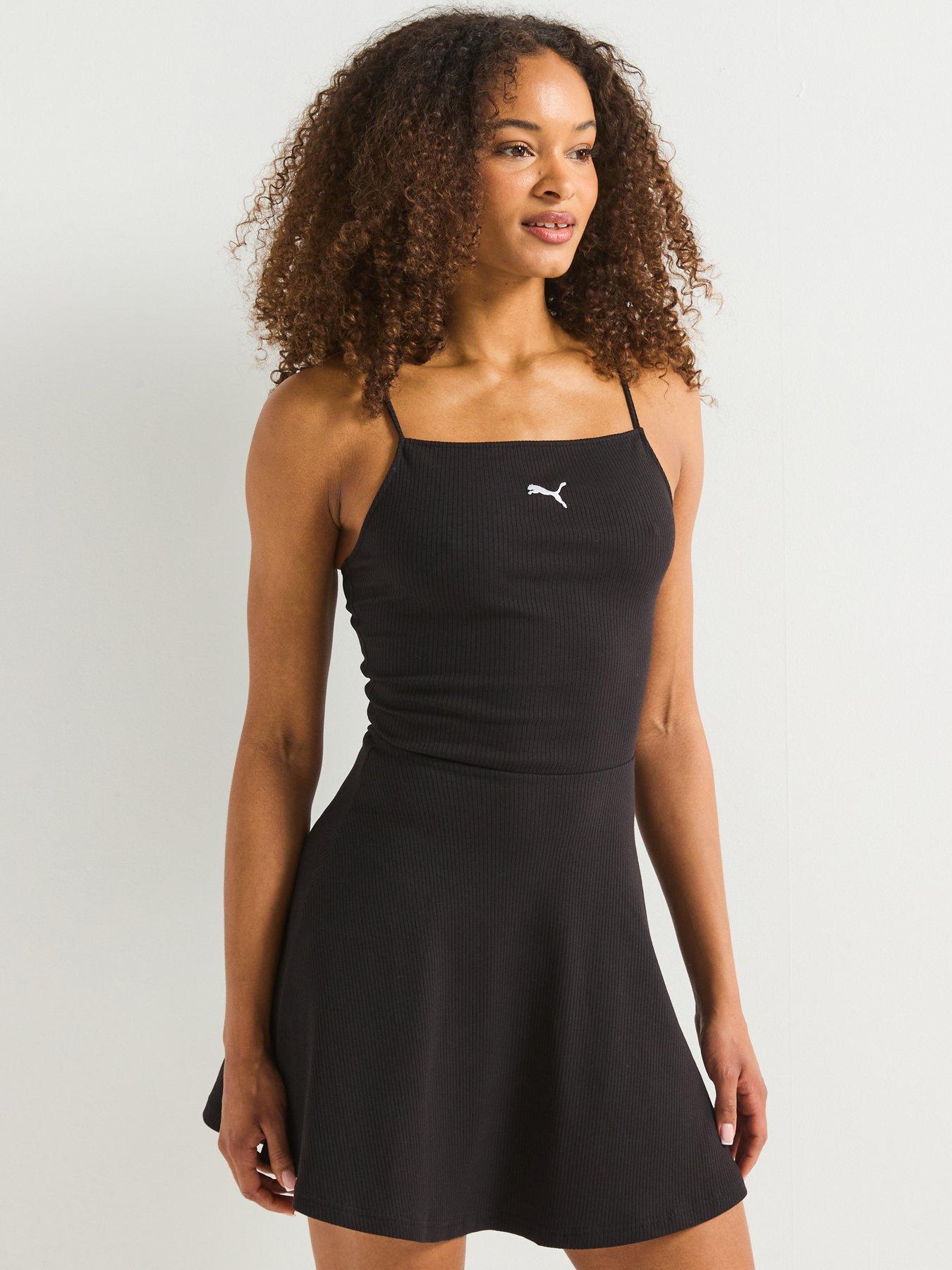 Image 1 of 6 of Puma Womens Wardrobe Essentials Ribbed Flared Short Dress - Puma Black