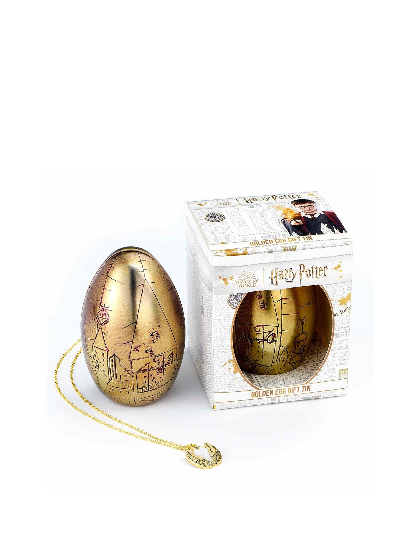 Product photograph of Harry Potter Boxed Golden Egg Necklace In A Gift Tin from very.co.uk