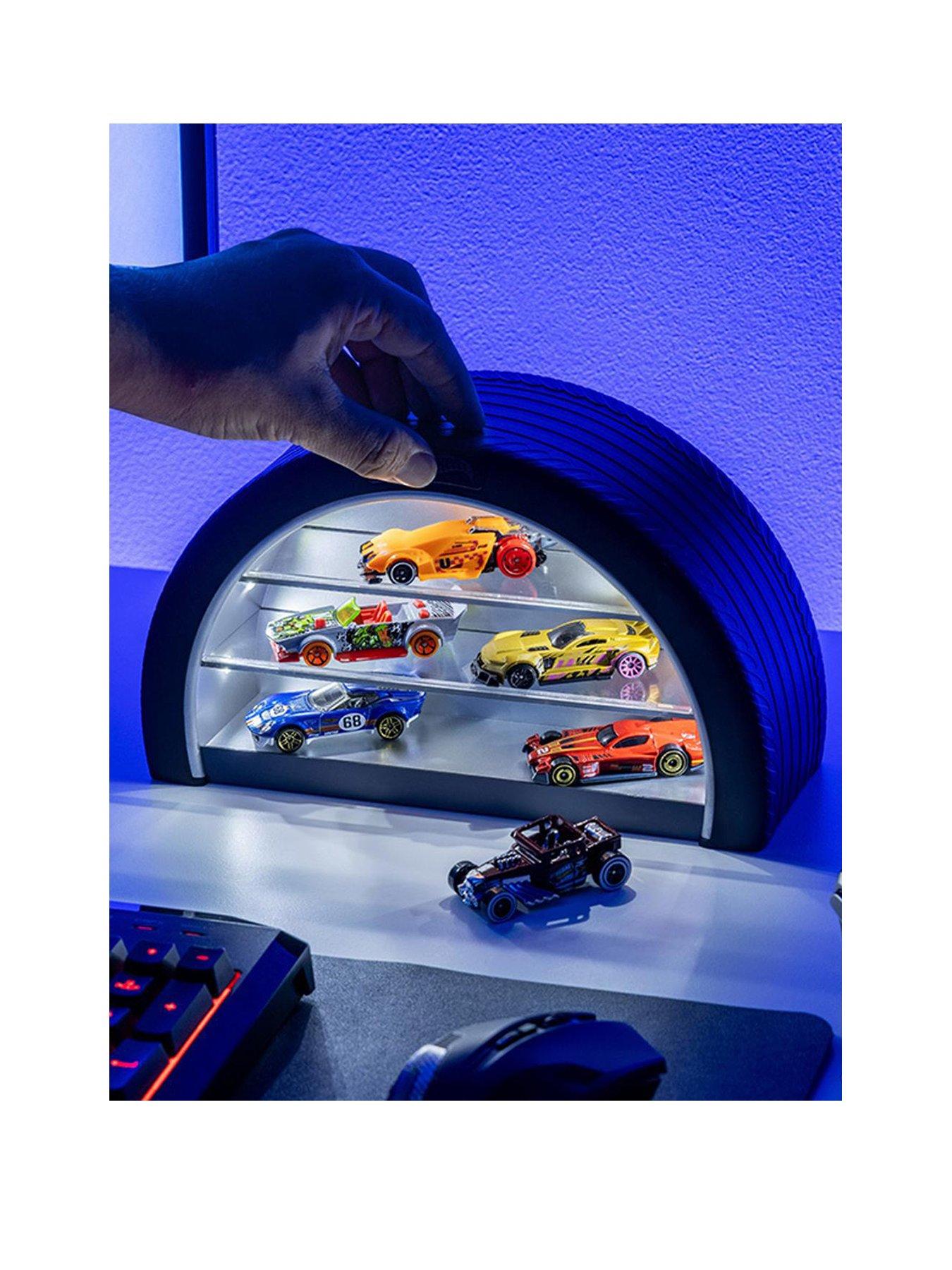 Product photograph of Hot Wheels Toy Car Display Case Light - Officially Licensedmerchandise Light Up Case Holds 8 Cars Wheel Shaped Wall Moutable Or Freestanding from very.co.uk