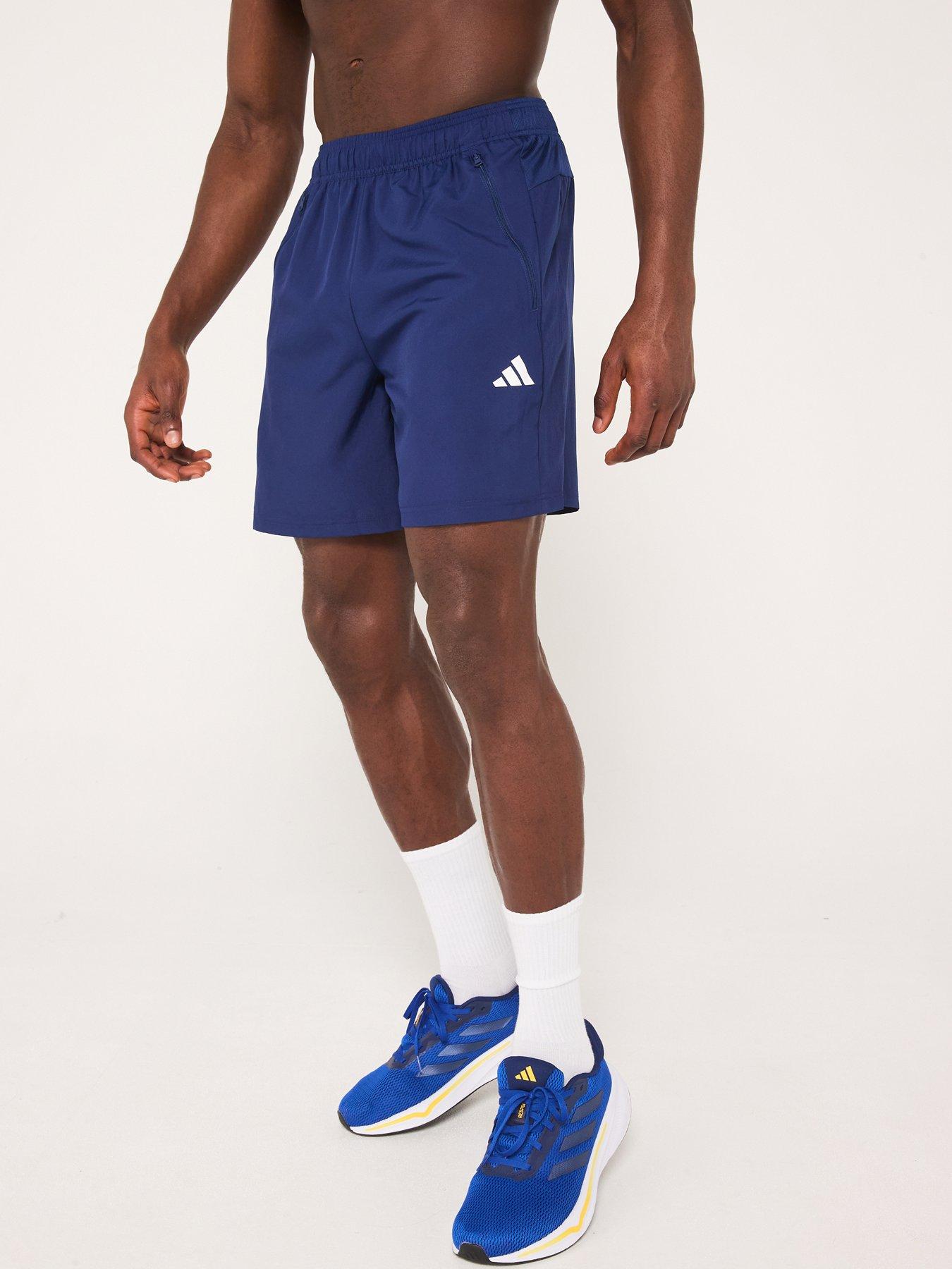 undefined Mens Train Essentials 7 Inch Woven Shorts - Dark Blue/White