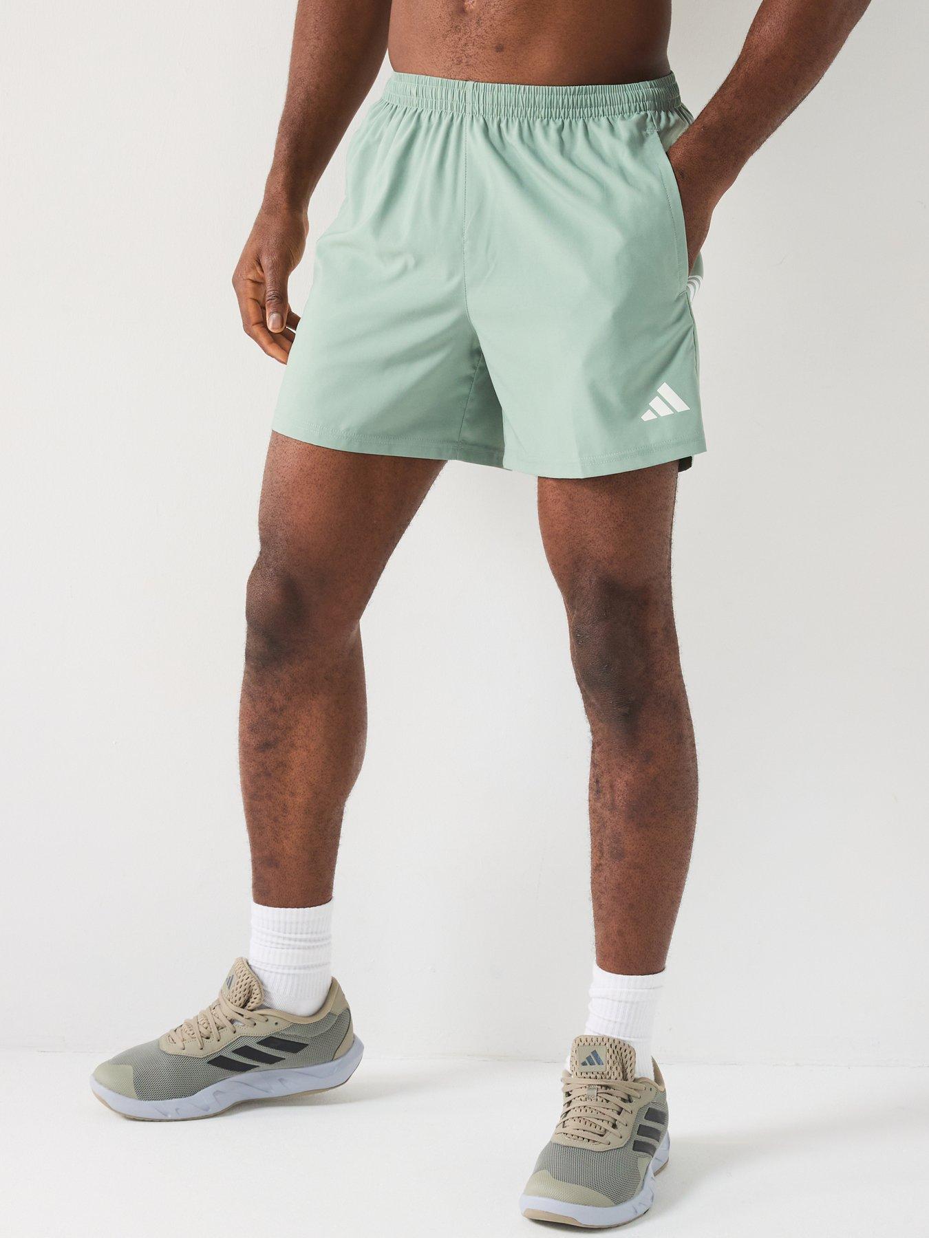 undefined Mens Running Own The Run 7 Inch Shorts - Silver Green