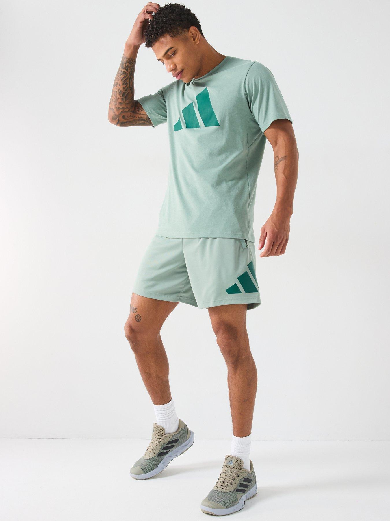 Image 3 of 6 of adidas Men's Train Essentials 7 Inch Logo Shorts - Silver Green/Collegiate Green