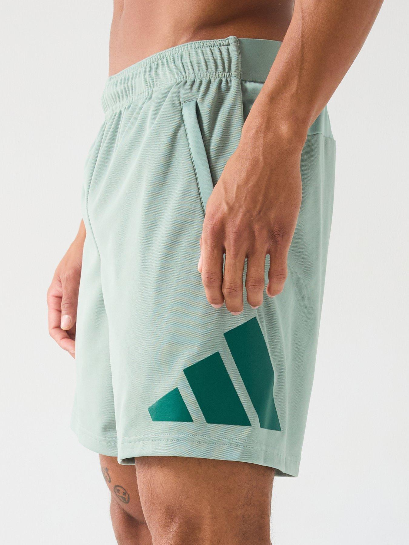 Image 4 of 6 of adidas Men's Train Essentials 7 Inch Logo Shorts - Silver Green/Collegiate Green