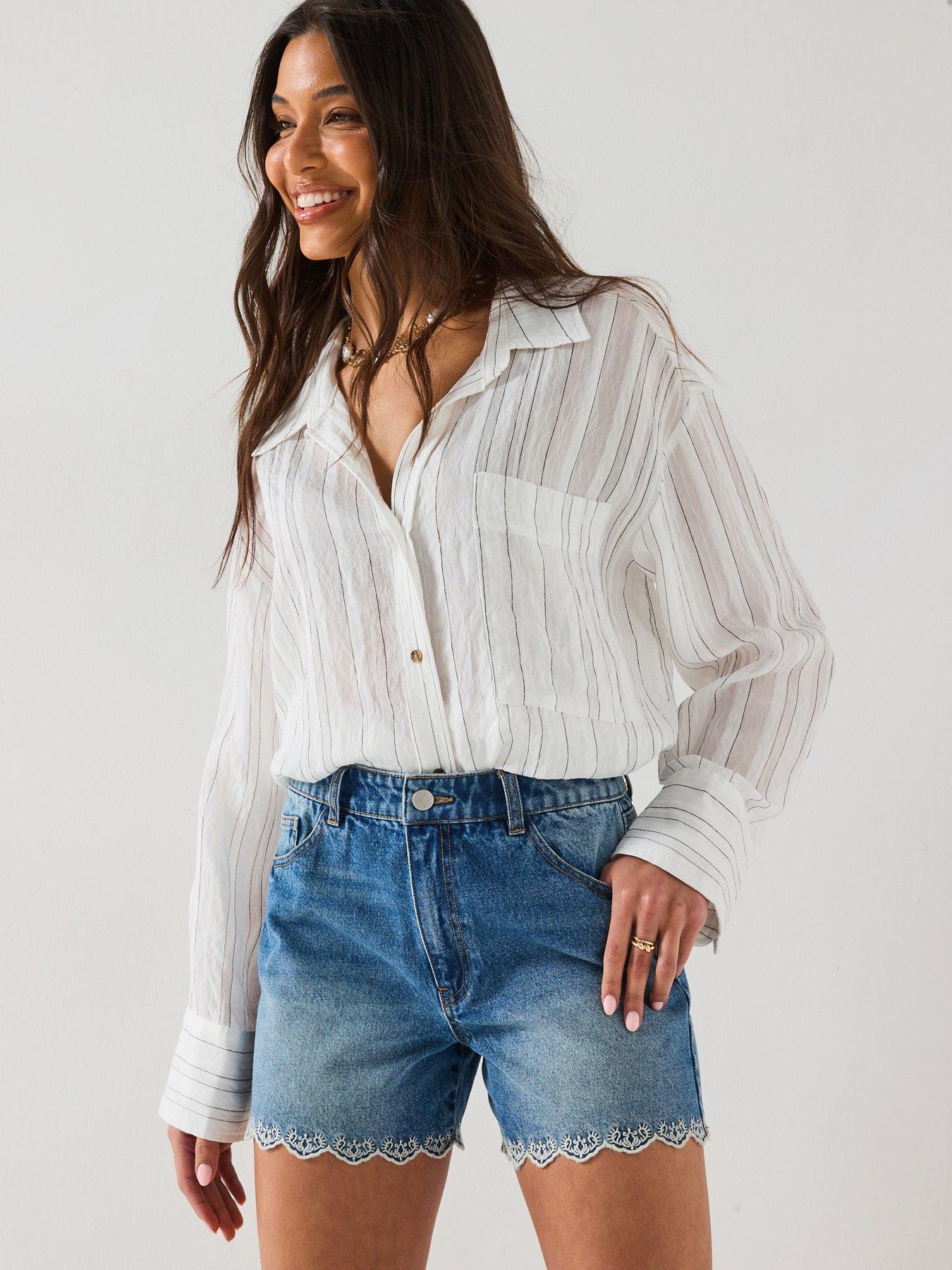 undefined Embroidered Hem Denim Shorts - Mid Wash