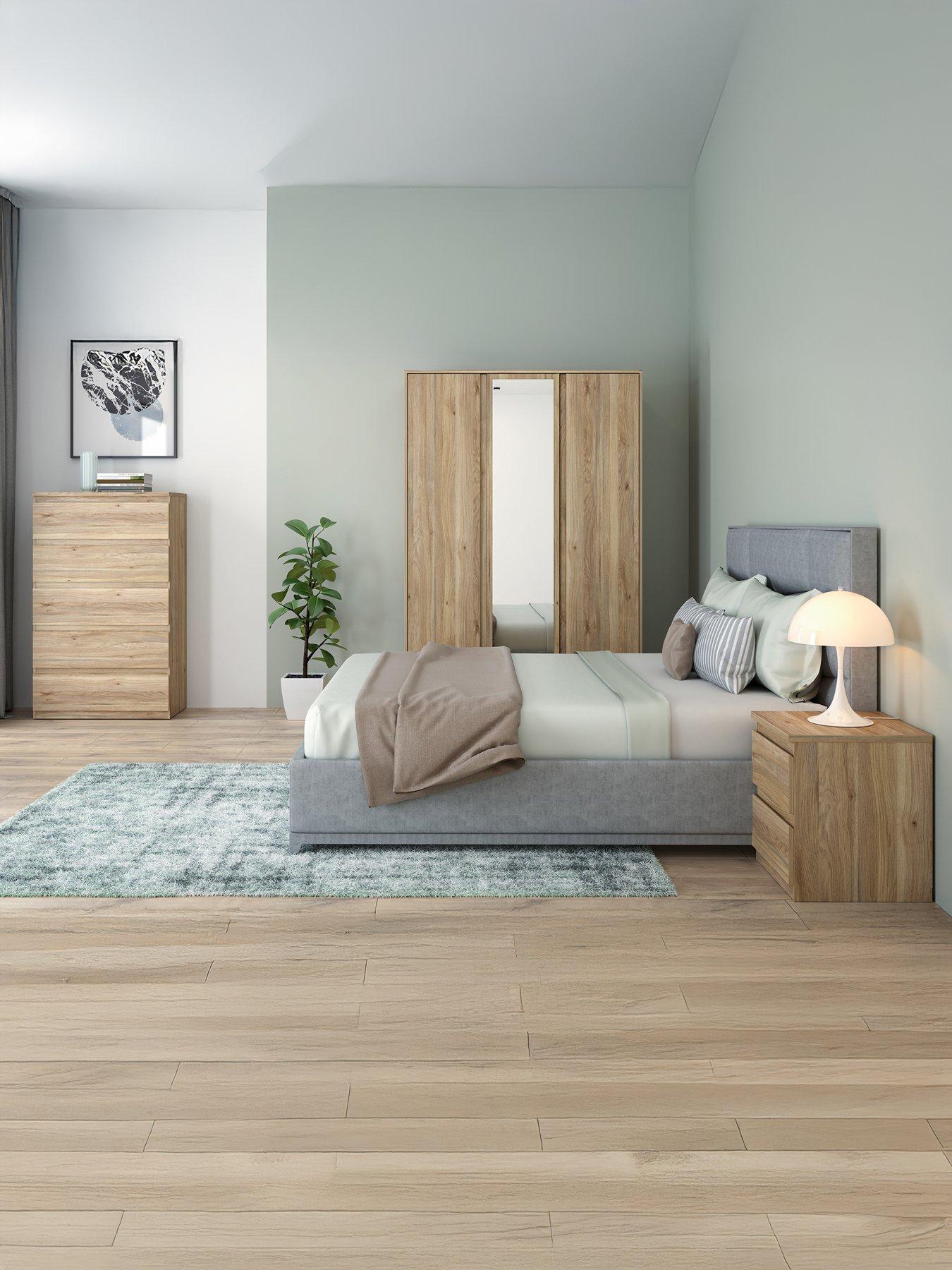 undefined Lisson 3 Piece Bedroom Furniture Set - 3 Door Mirrored Wardrobe, 5 Drawer Chest and 2 Drawer Bedside Table - New Oak - FSC® Certified