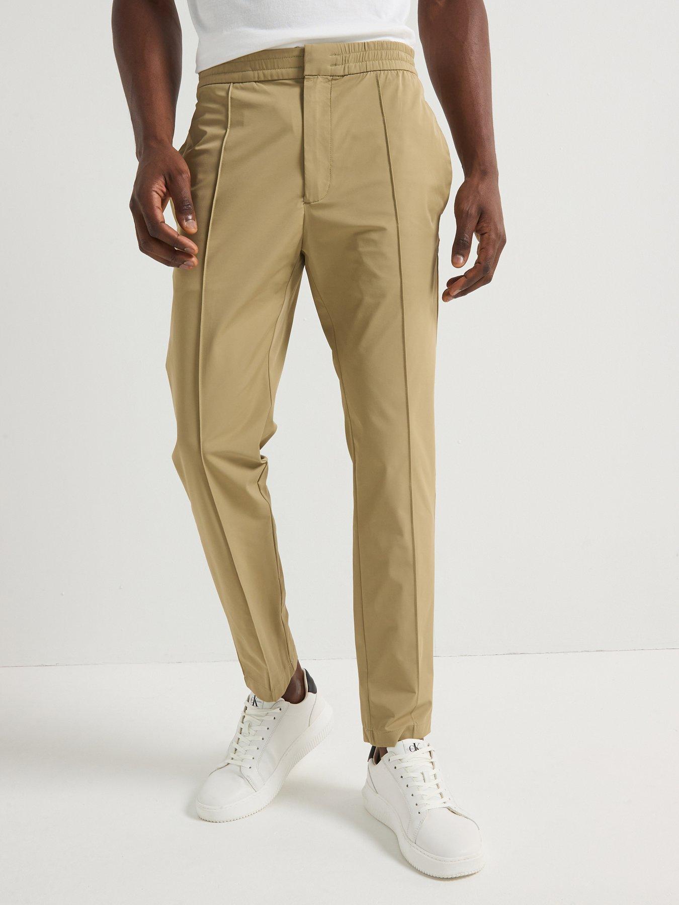 undefined Nylon Stretch Tapered Pintuck Casual Trousers - Natural
