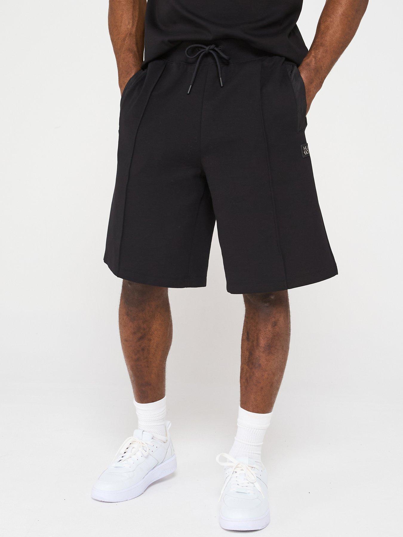 undefined Dilmos Metal Stacked Logo Jersey Shorts- Black
